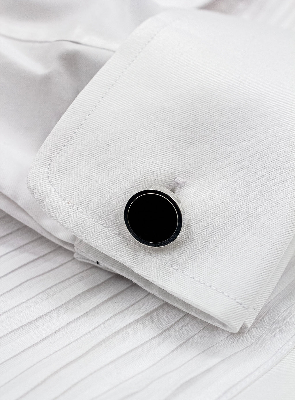 circular silver with black enamel cufflinks in shirt