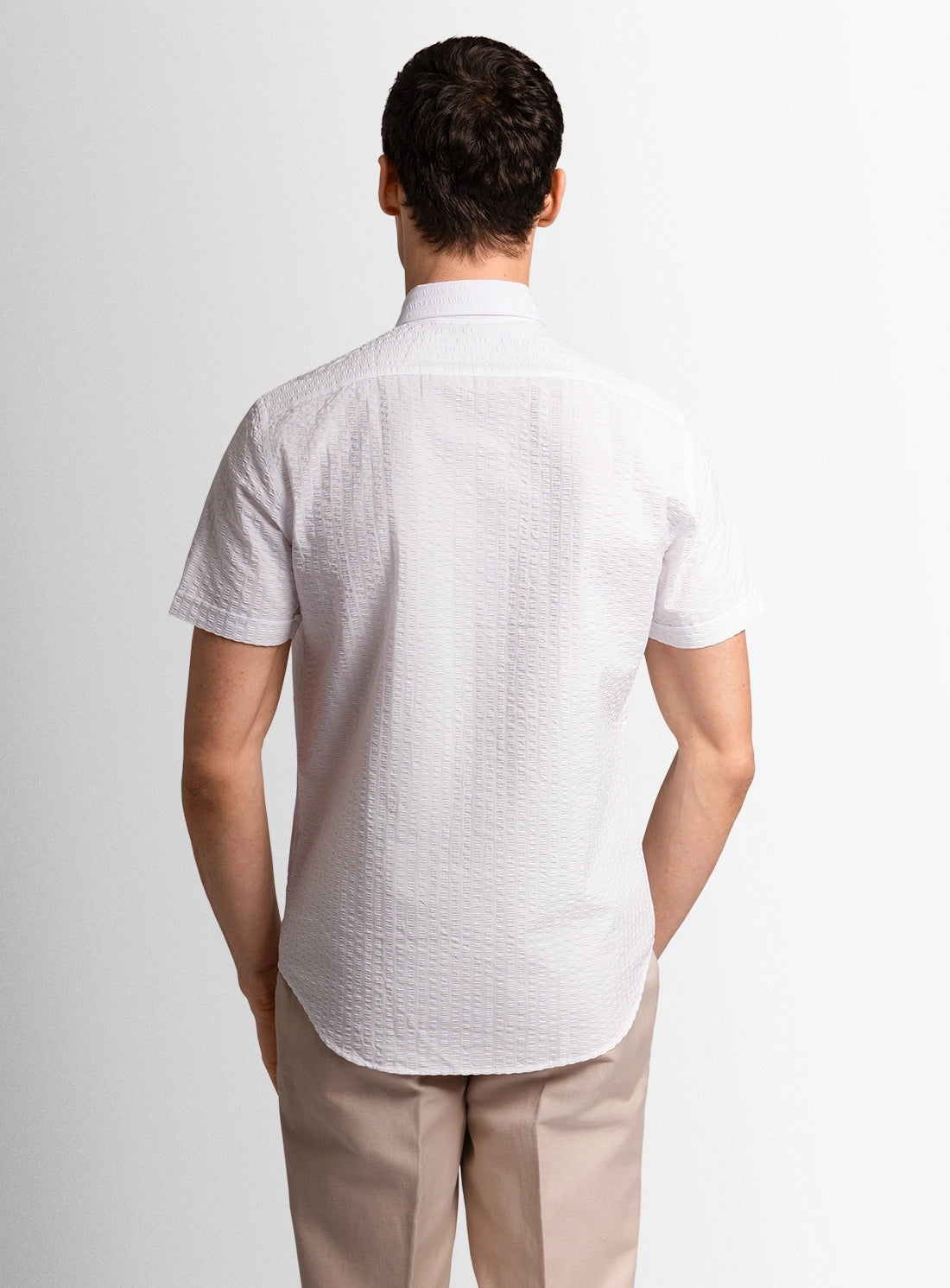 Green dress shirt with a Peter Jackson label on a white background