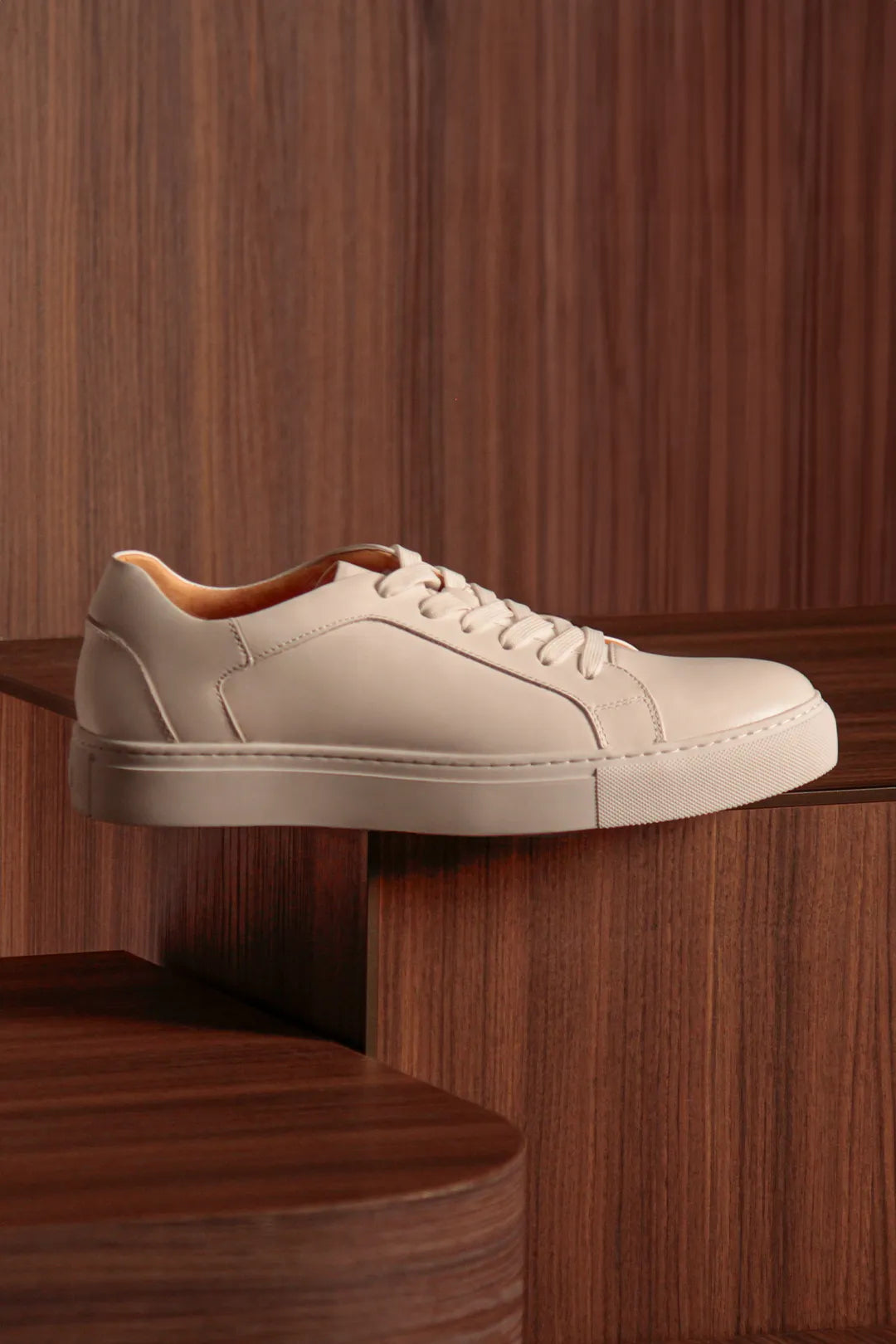 Sneaker sitting over a wooden box