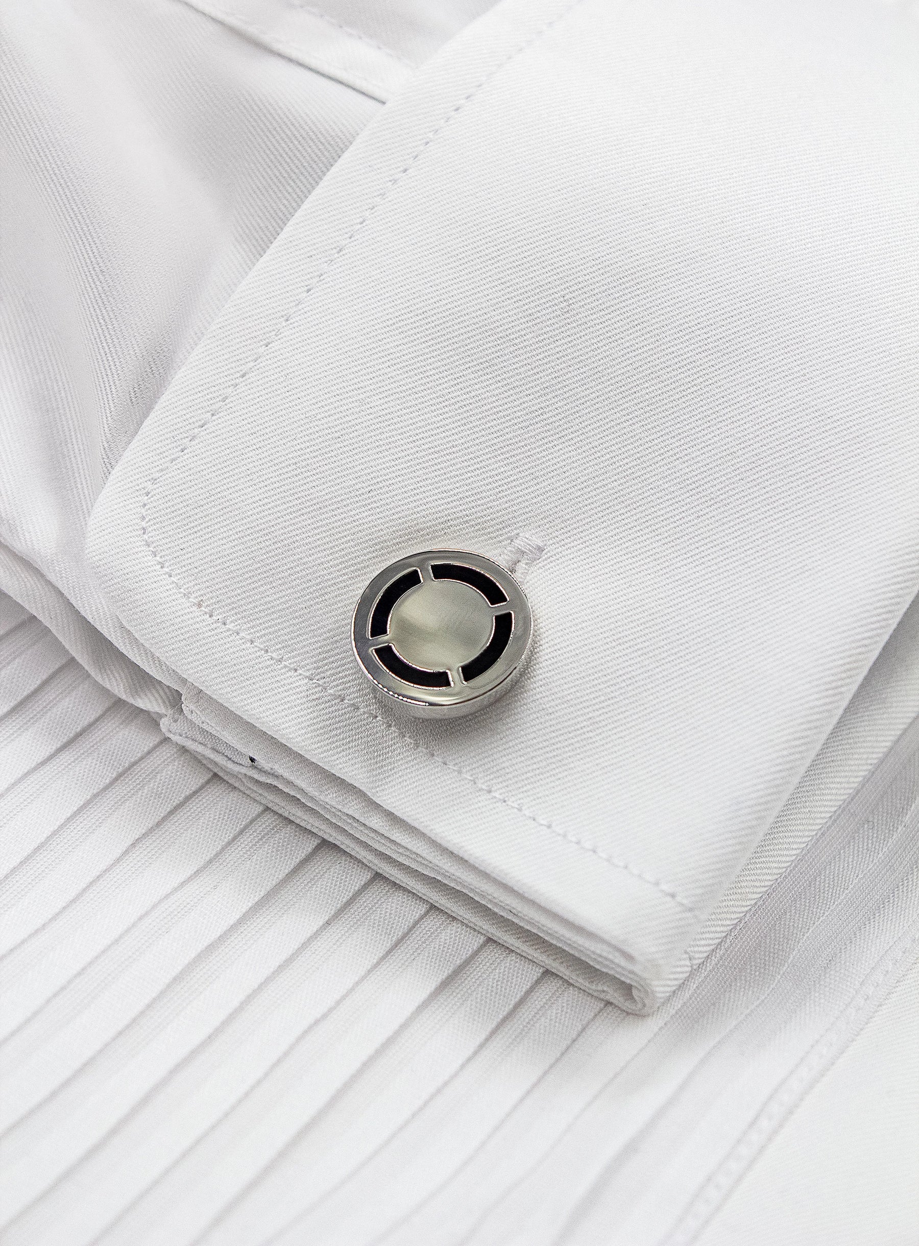 circular silver detailed cufflinks in shirt