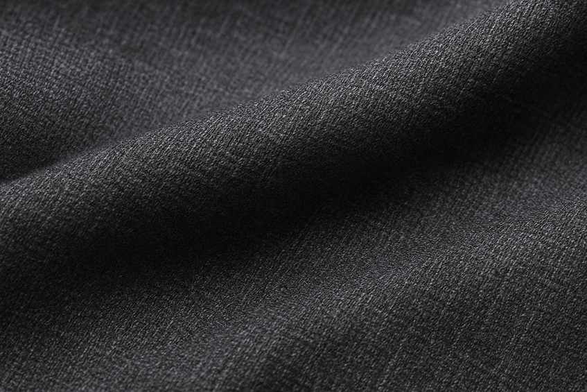 Close up of some dark grey suit material
