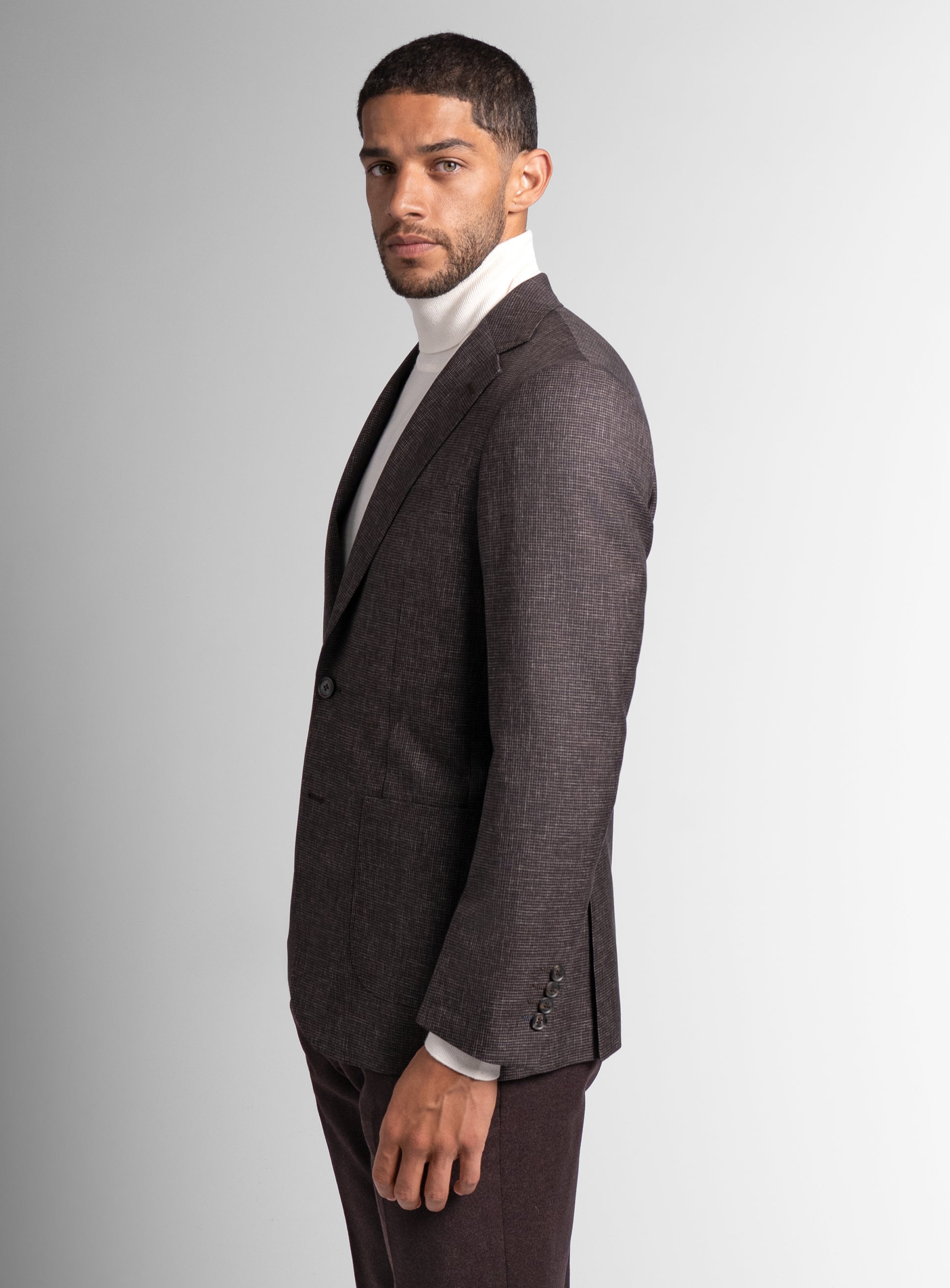 The side of the Mondovi Puppytooth Brown Jacket