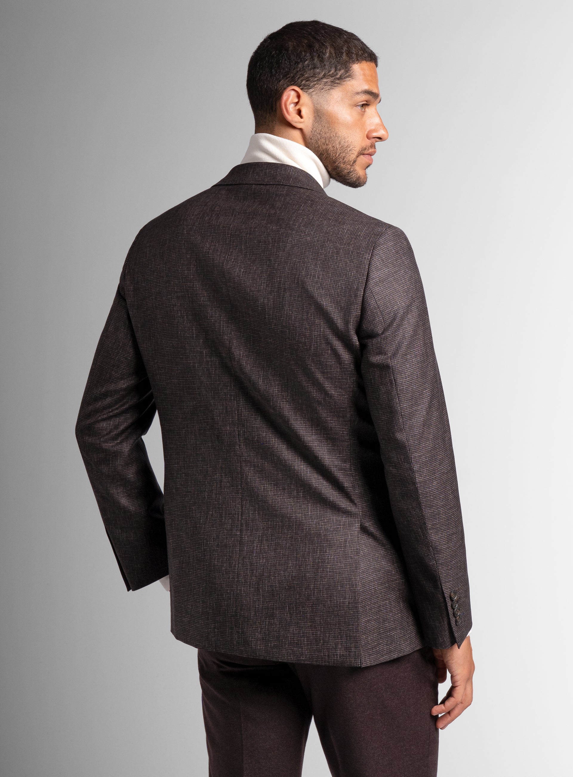 The back of the Mondovi Puppytooth Brown Jacket