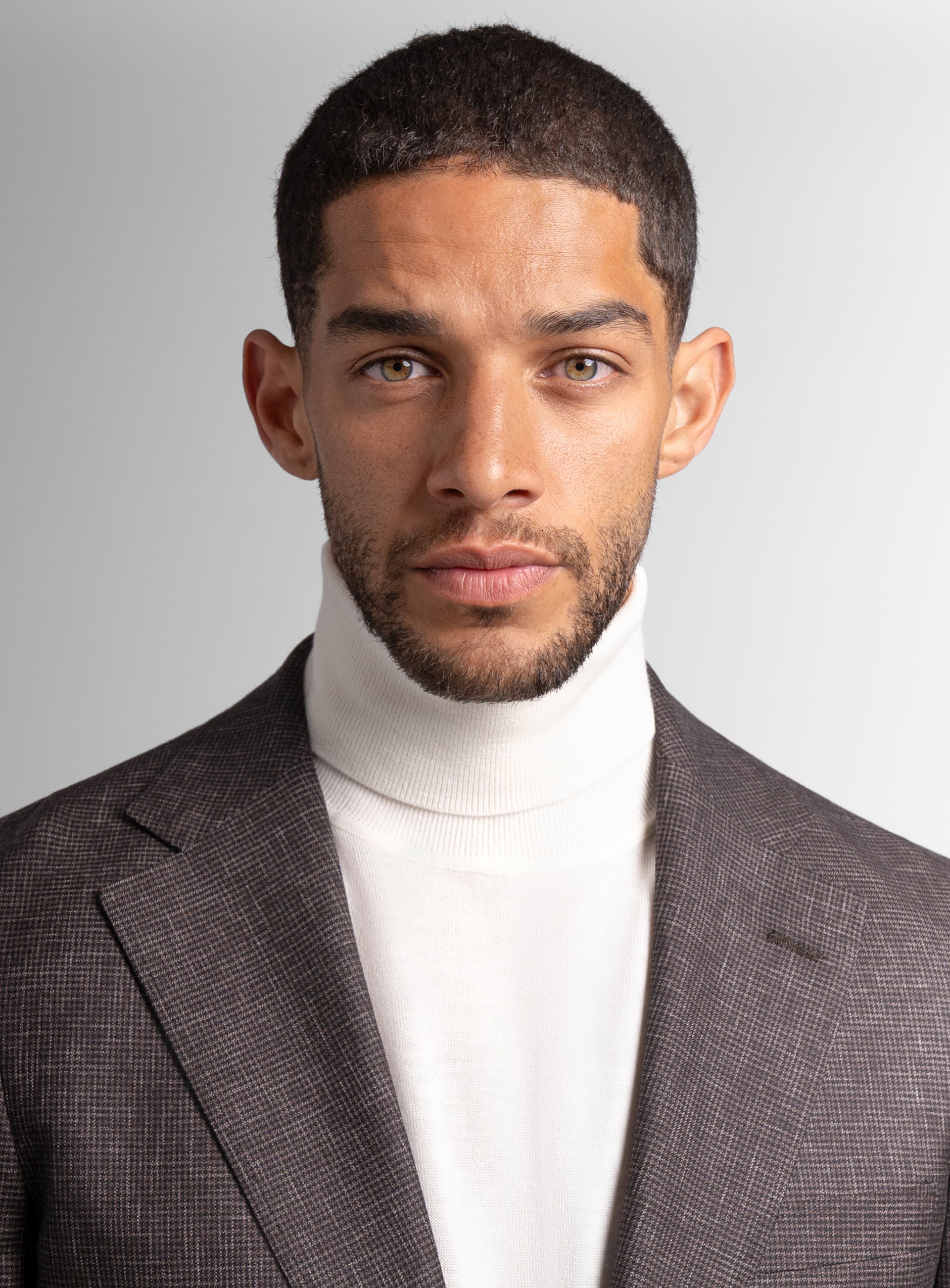 A front-view of the Mondovi Puppytooth Brown Jacket