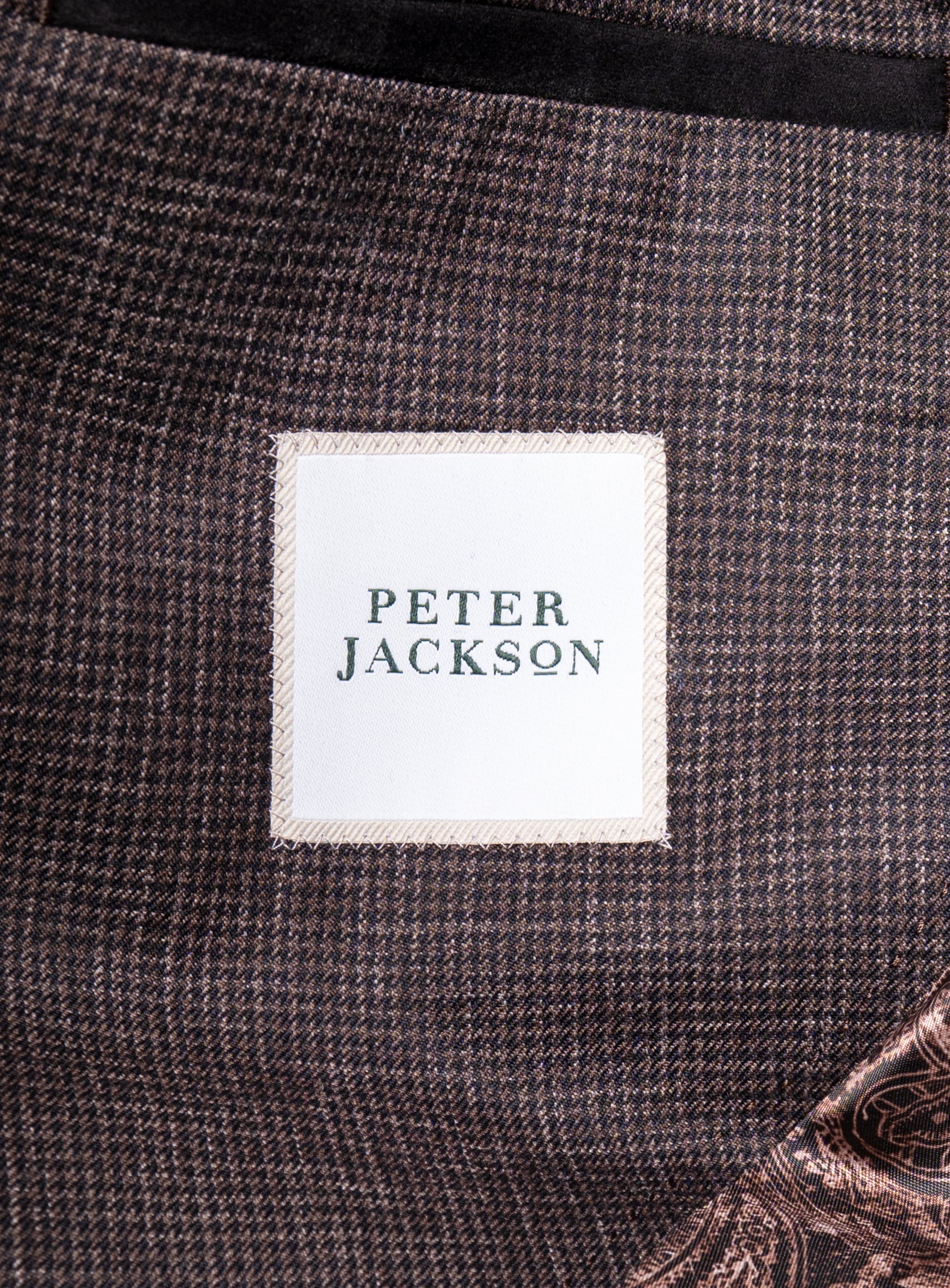 The "Peter Jackson" logo on the Mondovi Puppytooth Brown Jacket