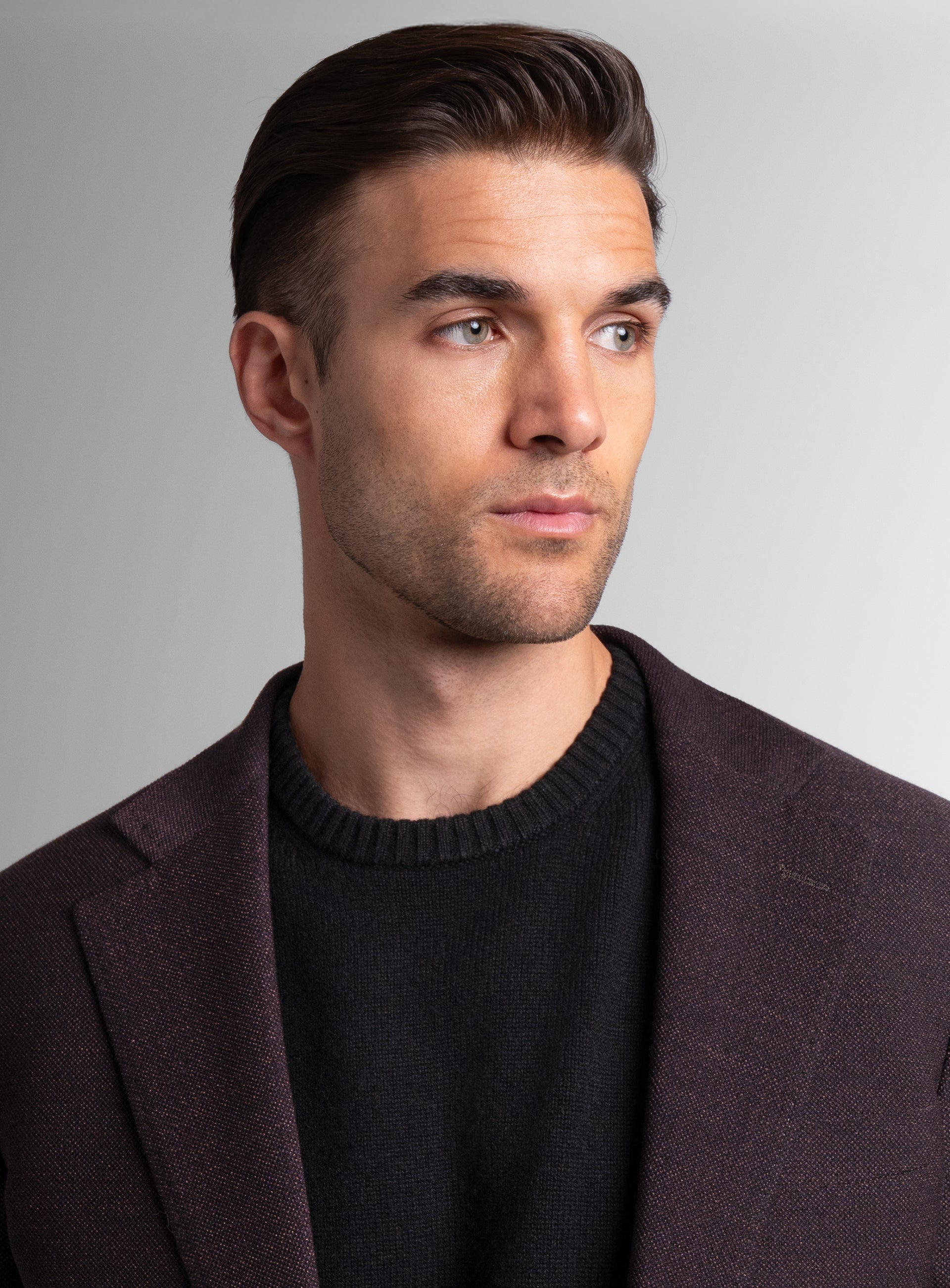 Close-up of a man wearing the Vitale Barleycorn Mahogany Red Sport Jacket