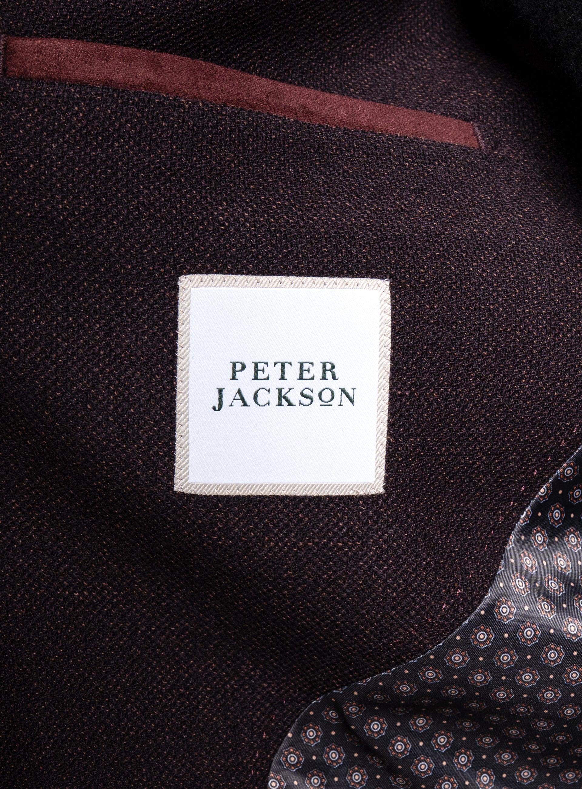 Close-up of the "Peter Jackson" label on the Vitale Barleycorn Mahogany Red Sport Jacket