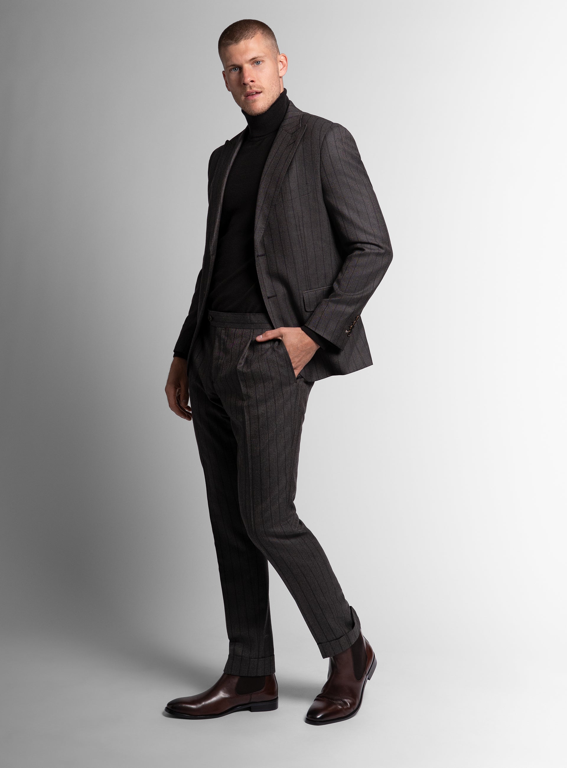 Man walking while wearing the Baroncelli Striped Brown Sport Jacket