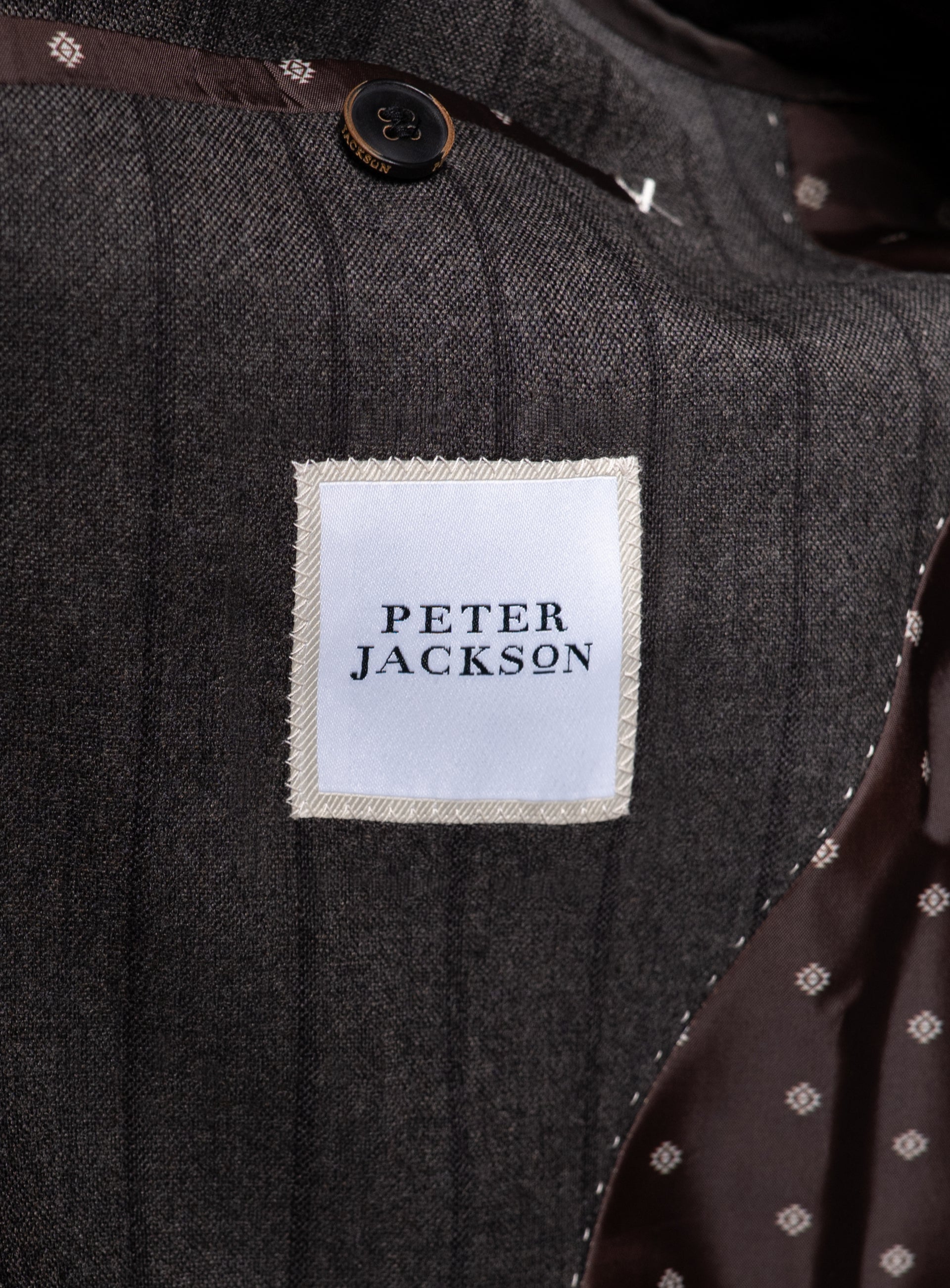 The Peter Jackson logo on the Baroncelli Striped Brown Sport Jacket