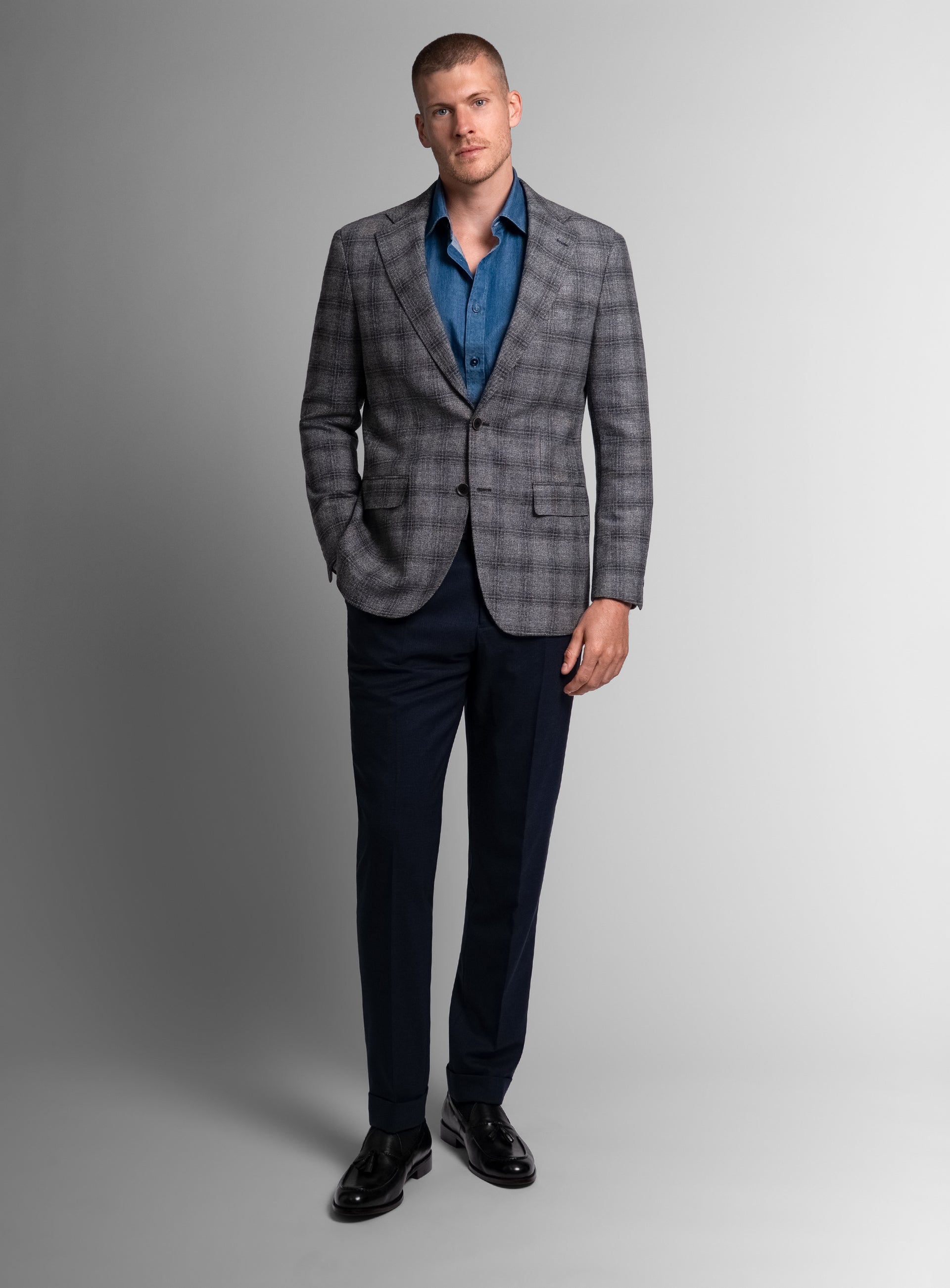 Man wearing the Vitale Barleycorn Plaid Grey Sport Jacket