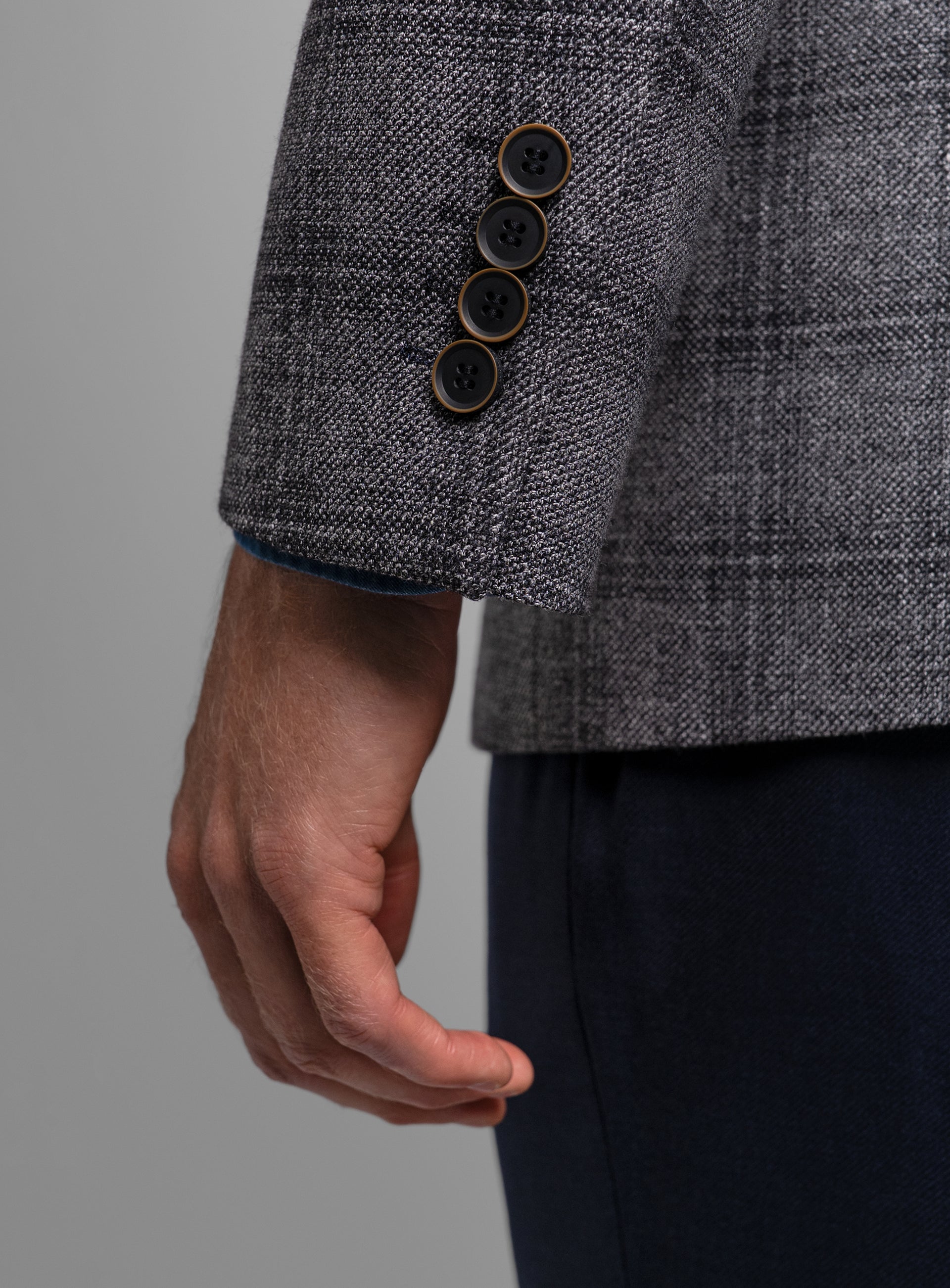 The sleeves on the Vitale Barleycorn Plaid Grey Sport Jacket