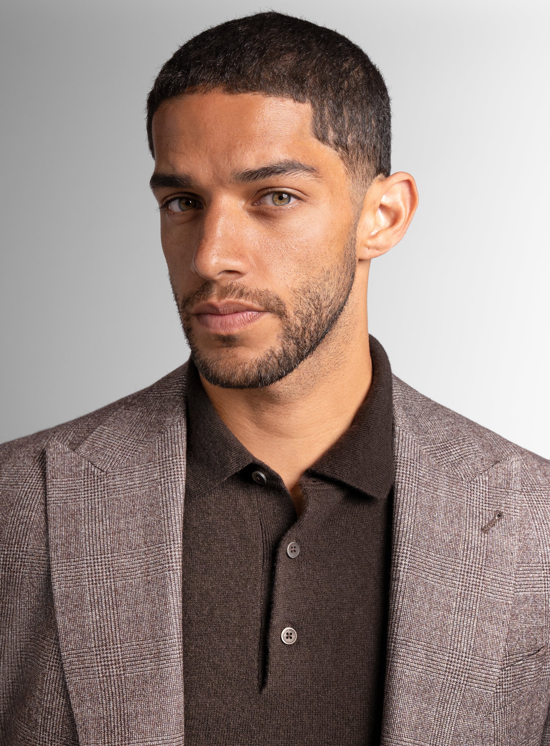 Close-up of man wearing the Portici Chocolate Brown Check Jacket