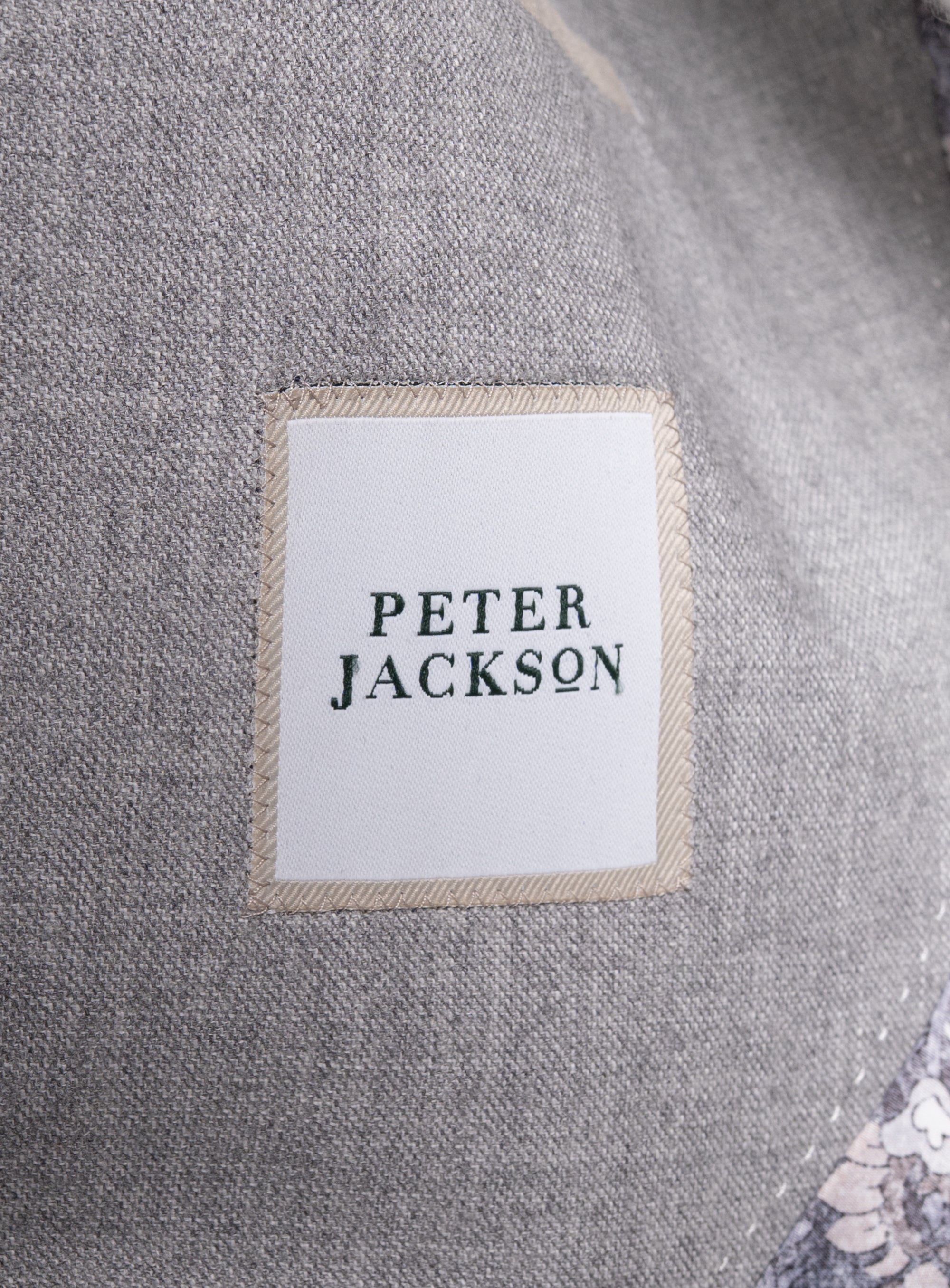 Close-up of the label on the Mondovi Silver Milled Basketweave Jacket