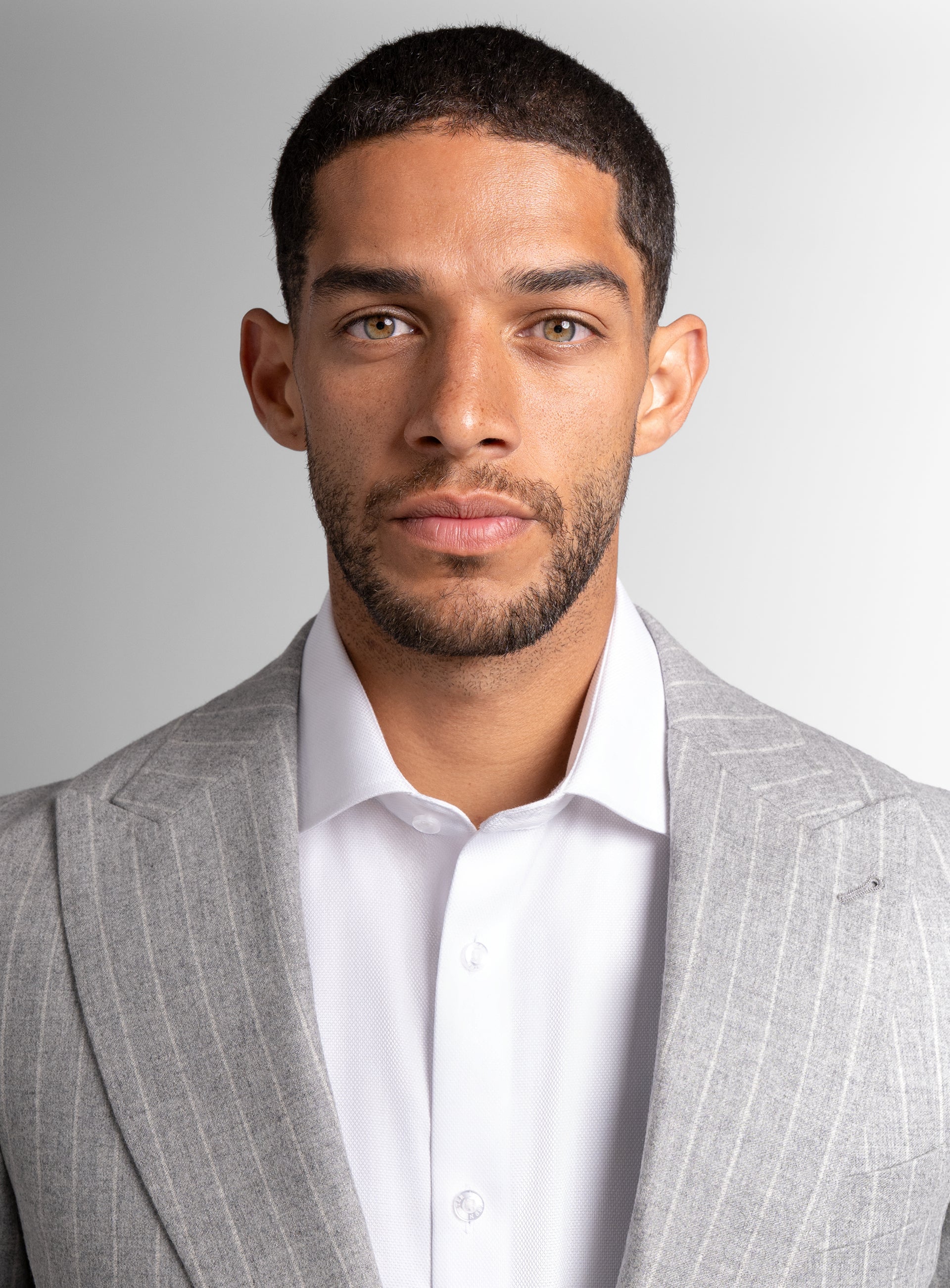 Close-up of man wearing the Portici Milled Pinstripe Silver Grey Jacket