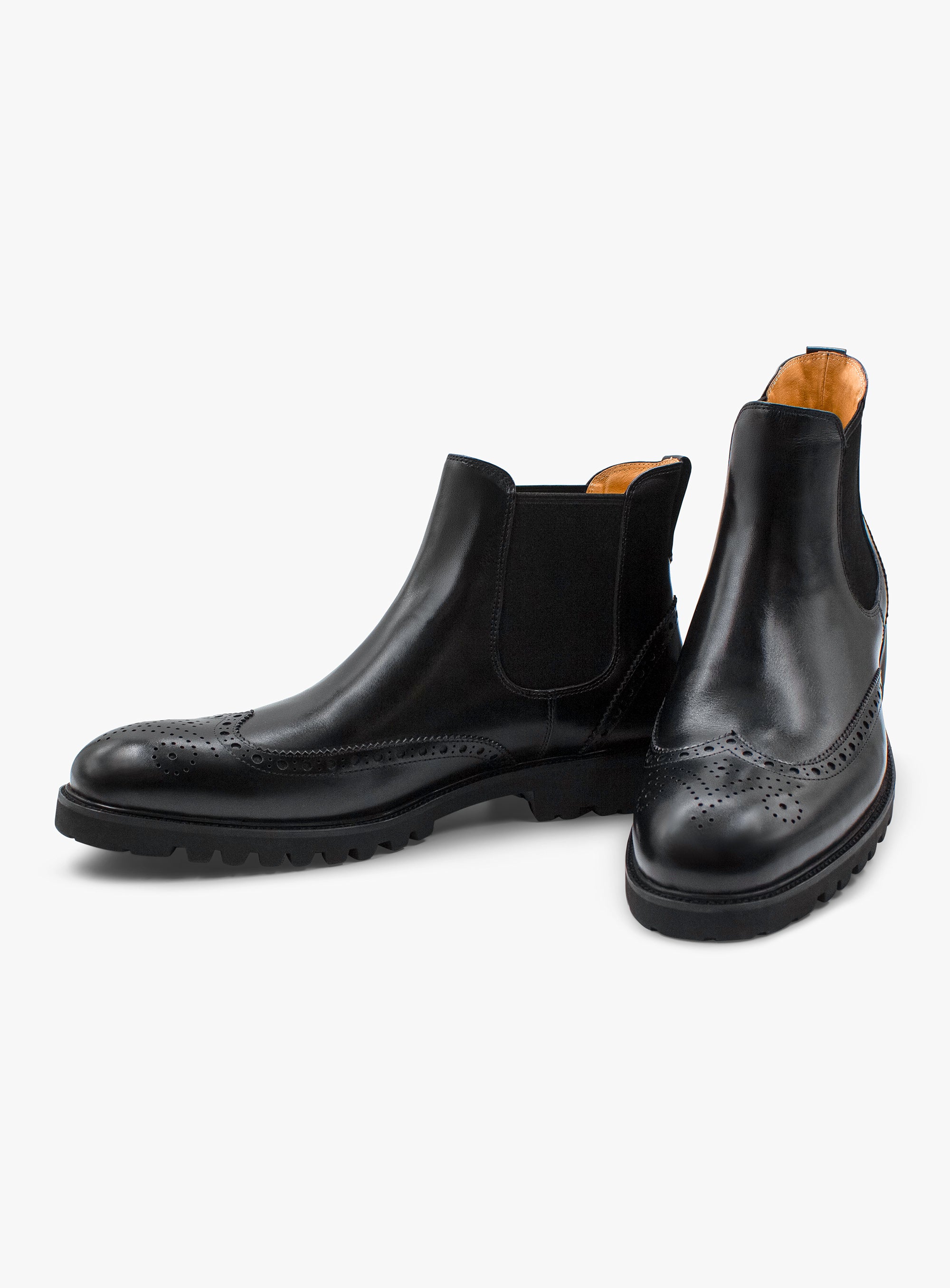 A pair of Corenzo Brogue Black Chelsea Boots