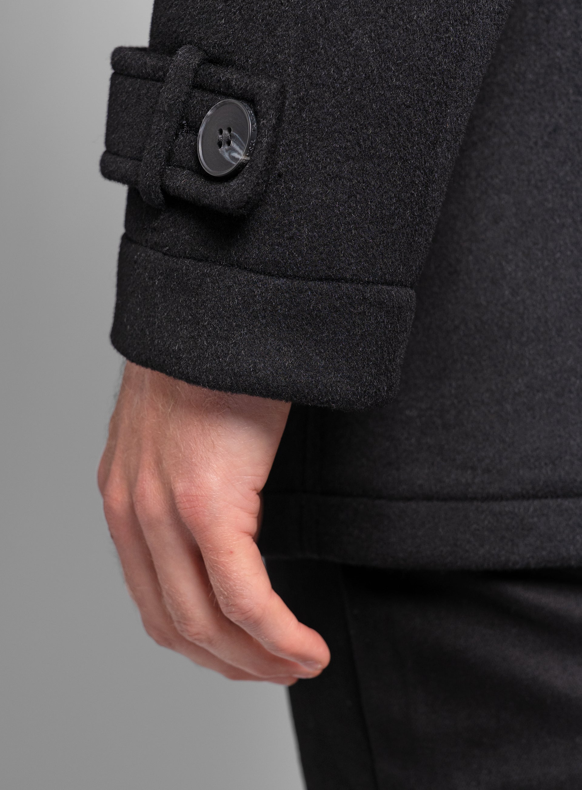 Close-up of the sleeves on the Bridge Black Peacoat