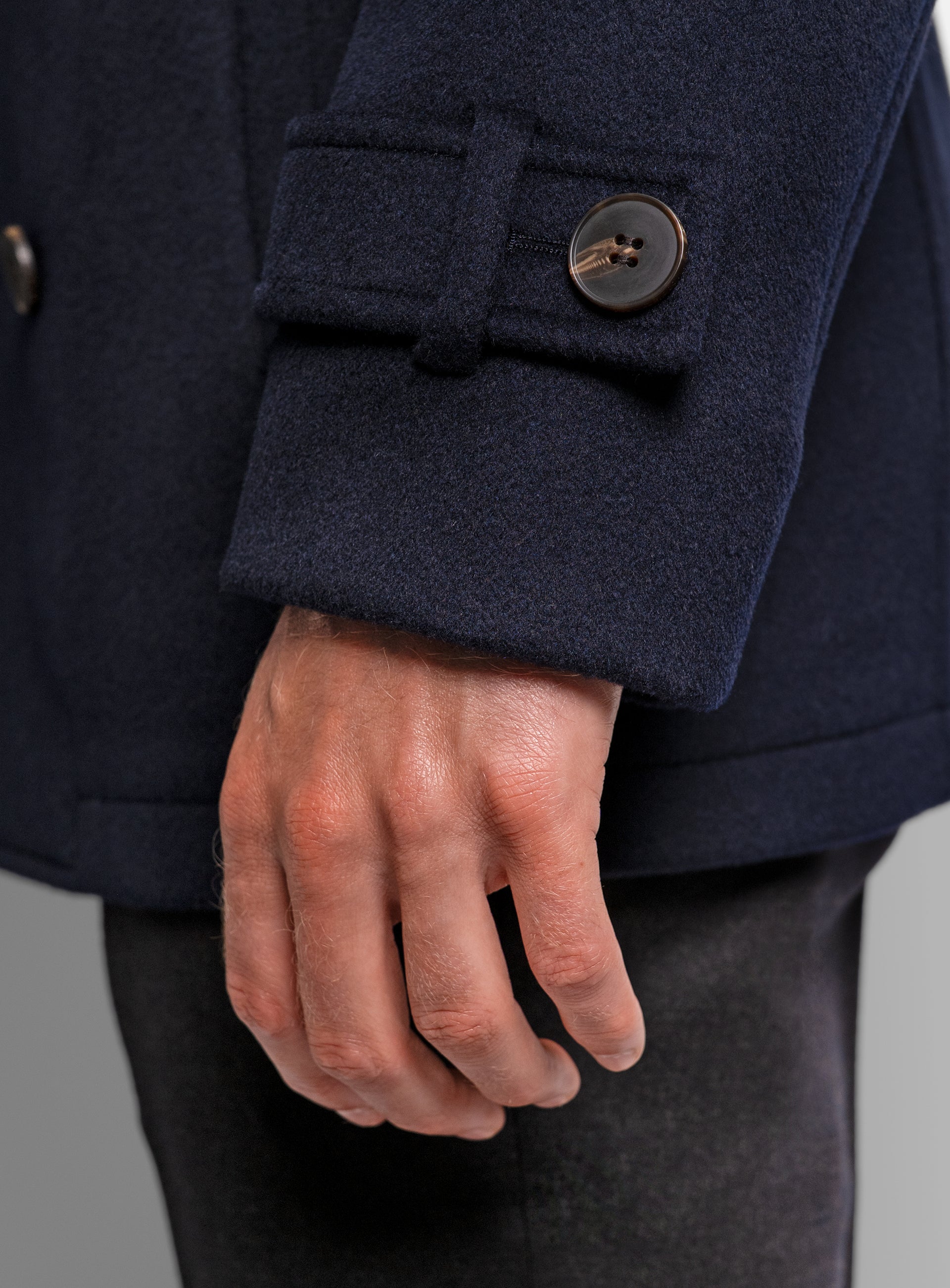 Close-up of the sleeves on the Bridge Navy Blue Peacoat
