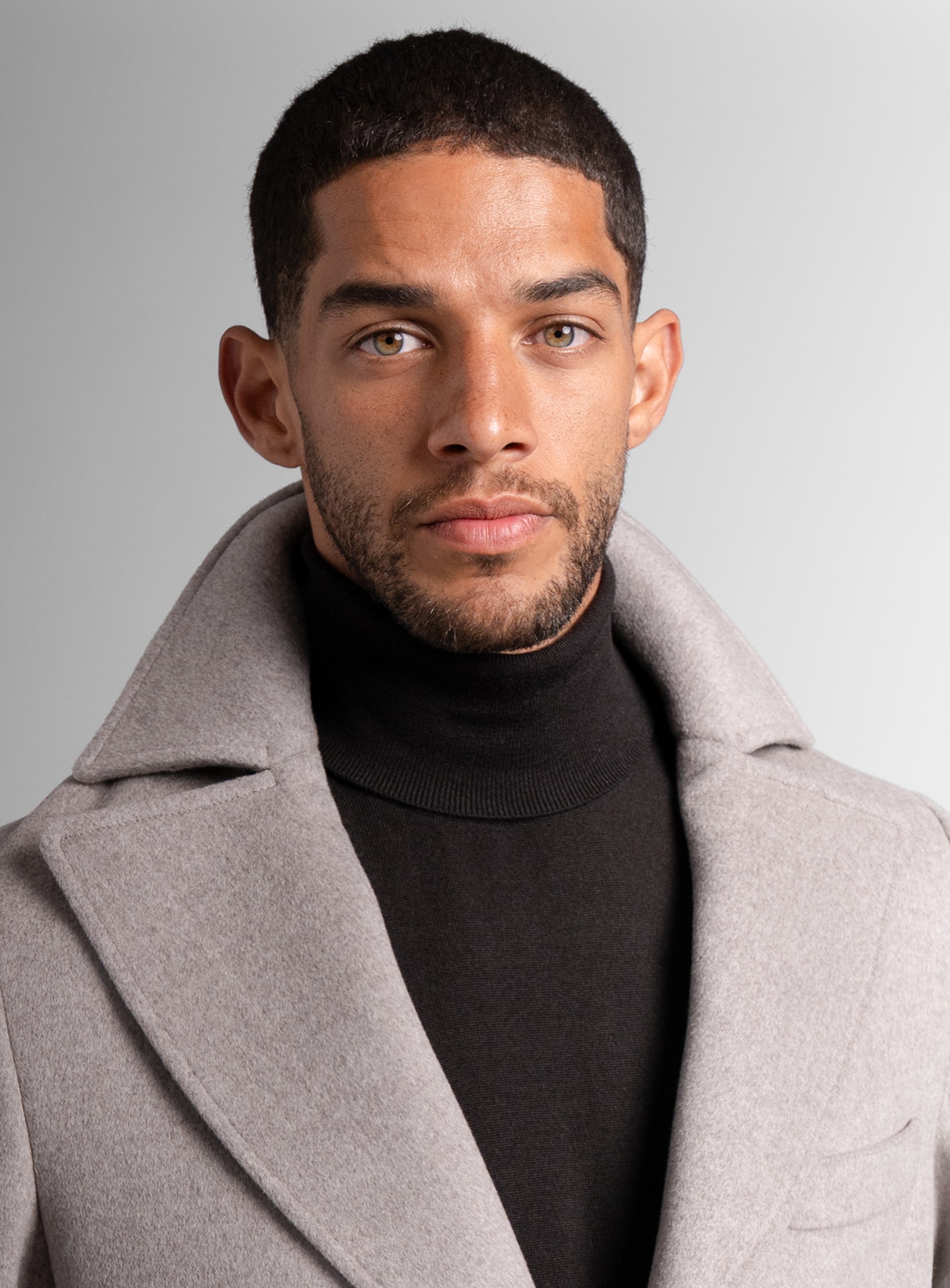 Close-up of a man wearing the Gallio Wool Pile Oat Beige Coat