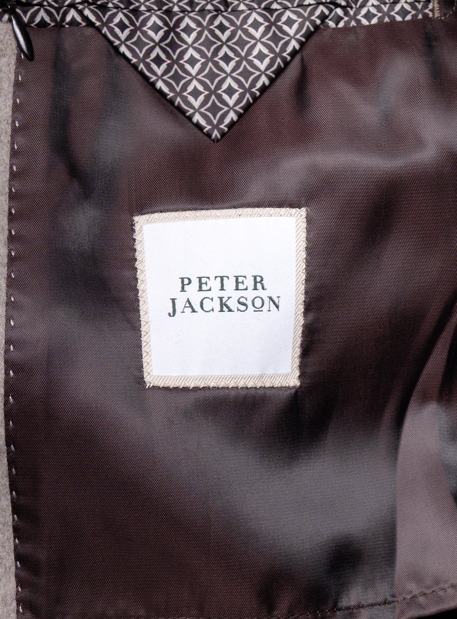 The "Peter Jacskon" logo on the Gallio Wool Pile Oat Beige Coat
