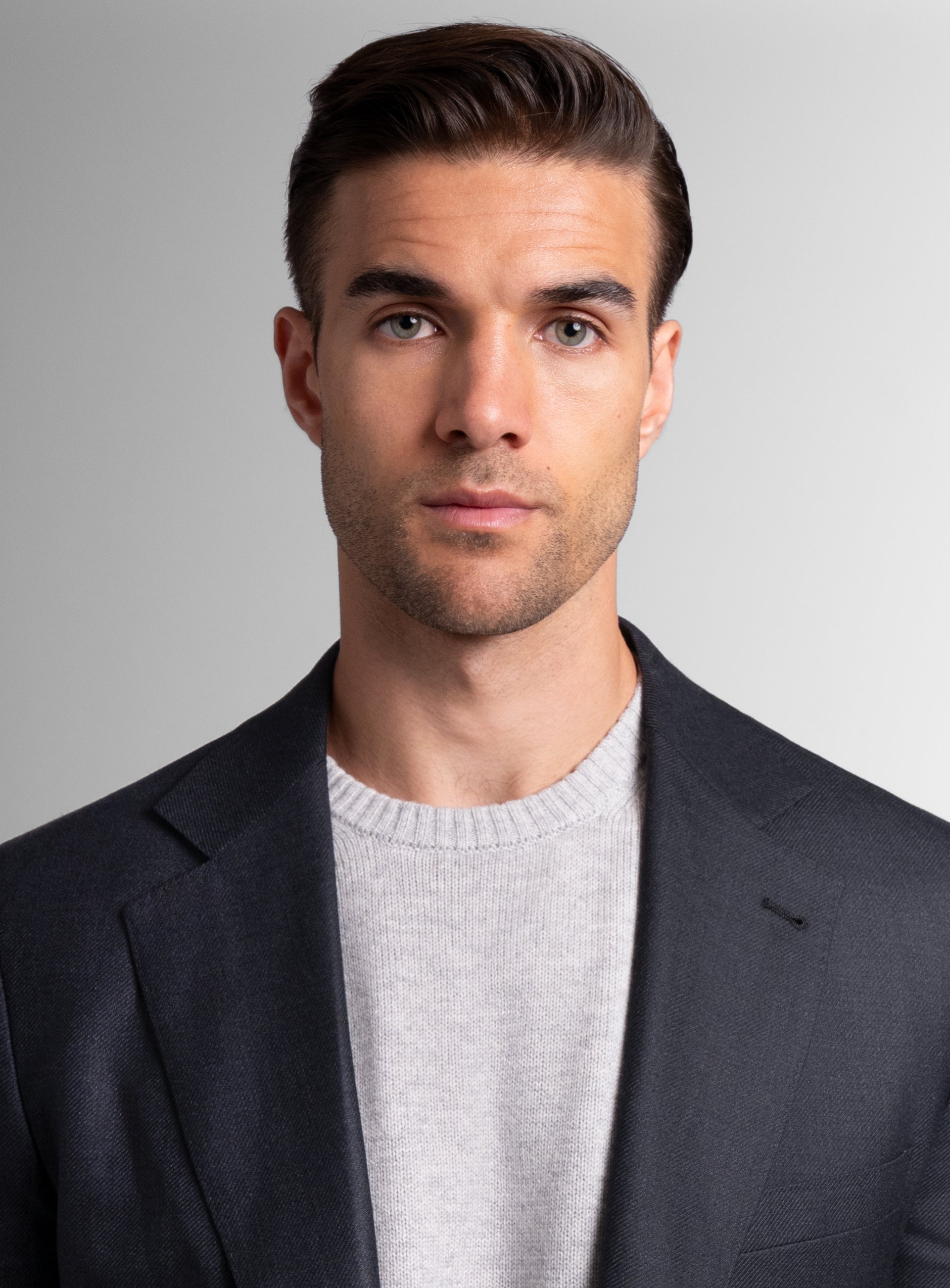 Close-up of a man wearing the Vito Twill Black Jacket