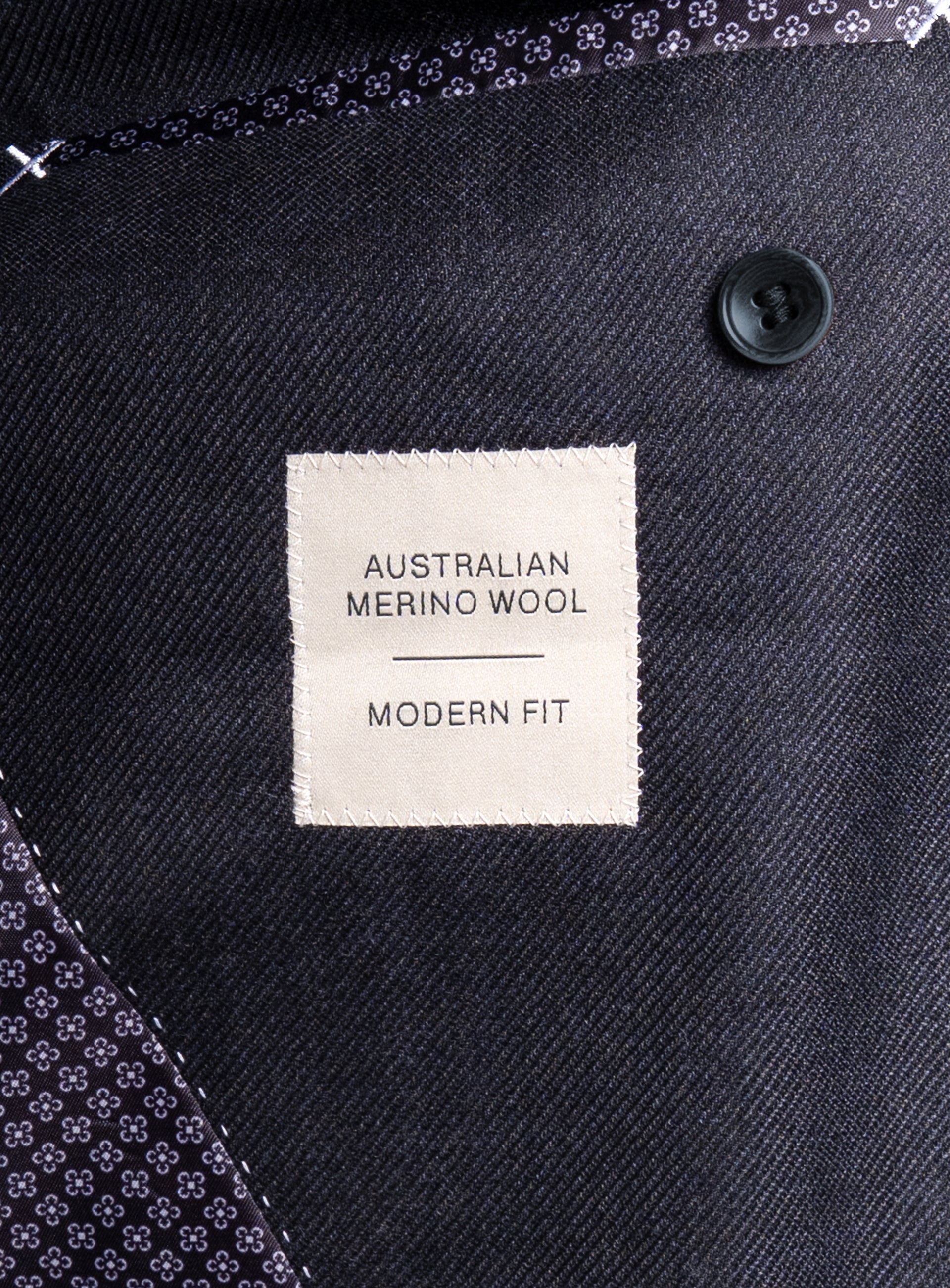 A label that says "Australian Merino Wool - Modern Fit" on the Vito Twill Black Jacket