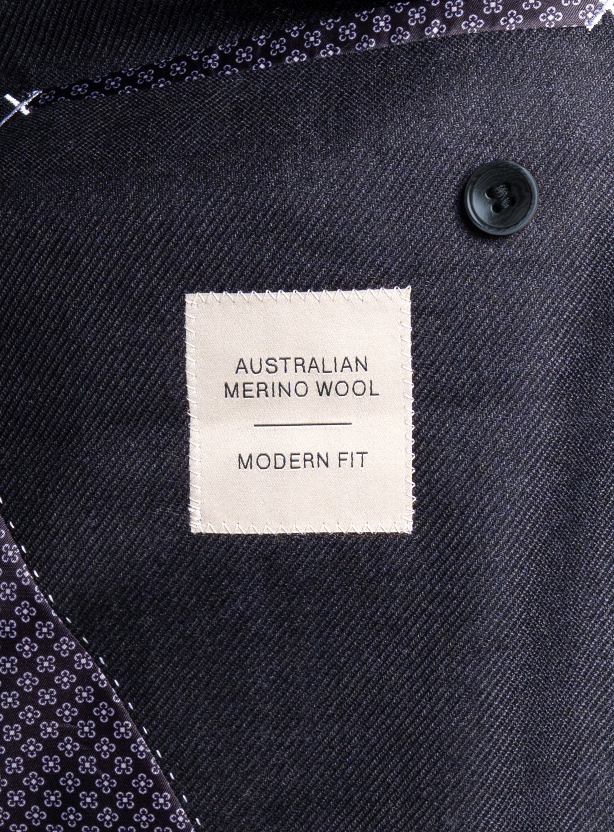 A label that says "Australian Merino Wool - Modern Fit" on the Vito Twill Black Jacket