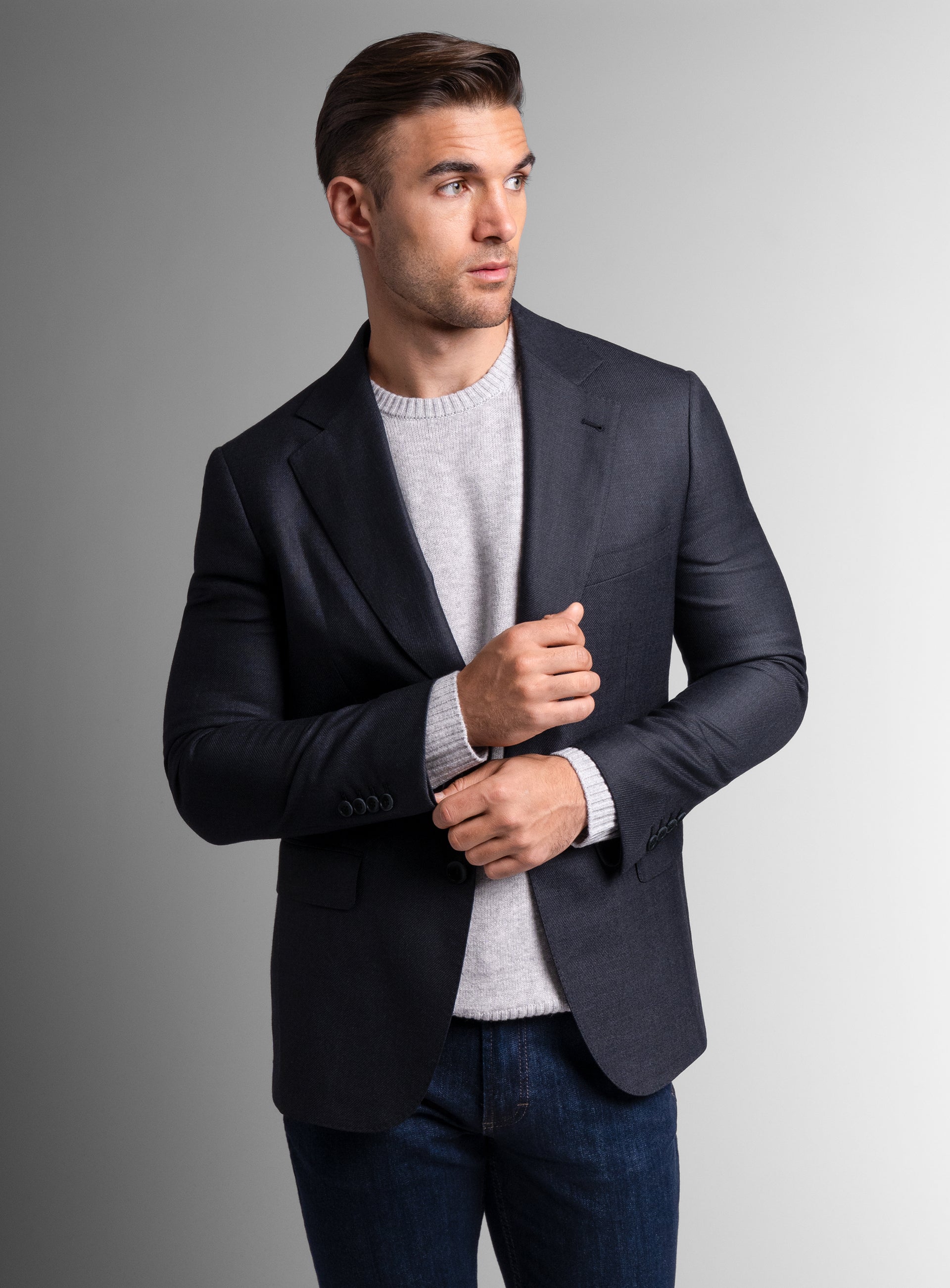 A man wearing the Vito Twill Black Jacket