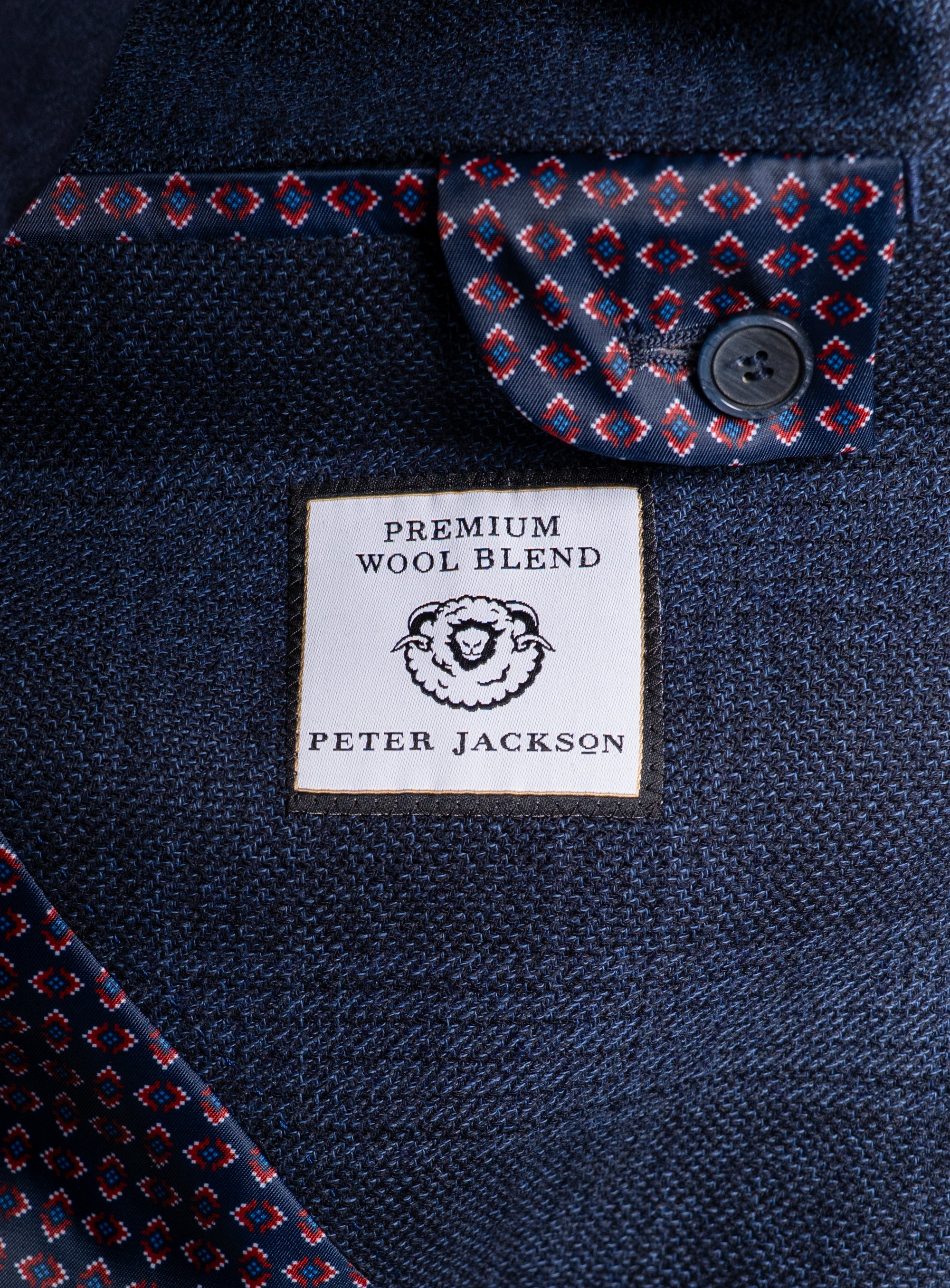 Label that says "Premium Wool Blend - Peter Jackson" on the Luzio Milled Plaid Navy Jacket
