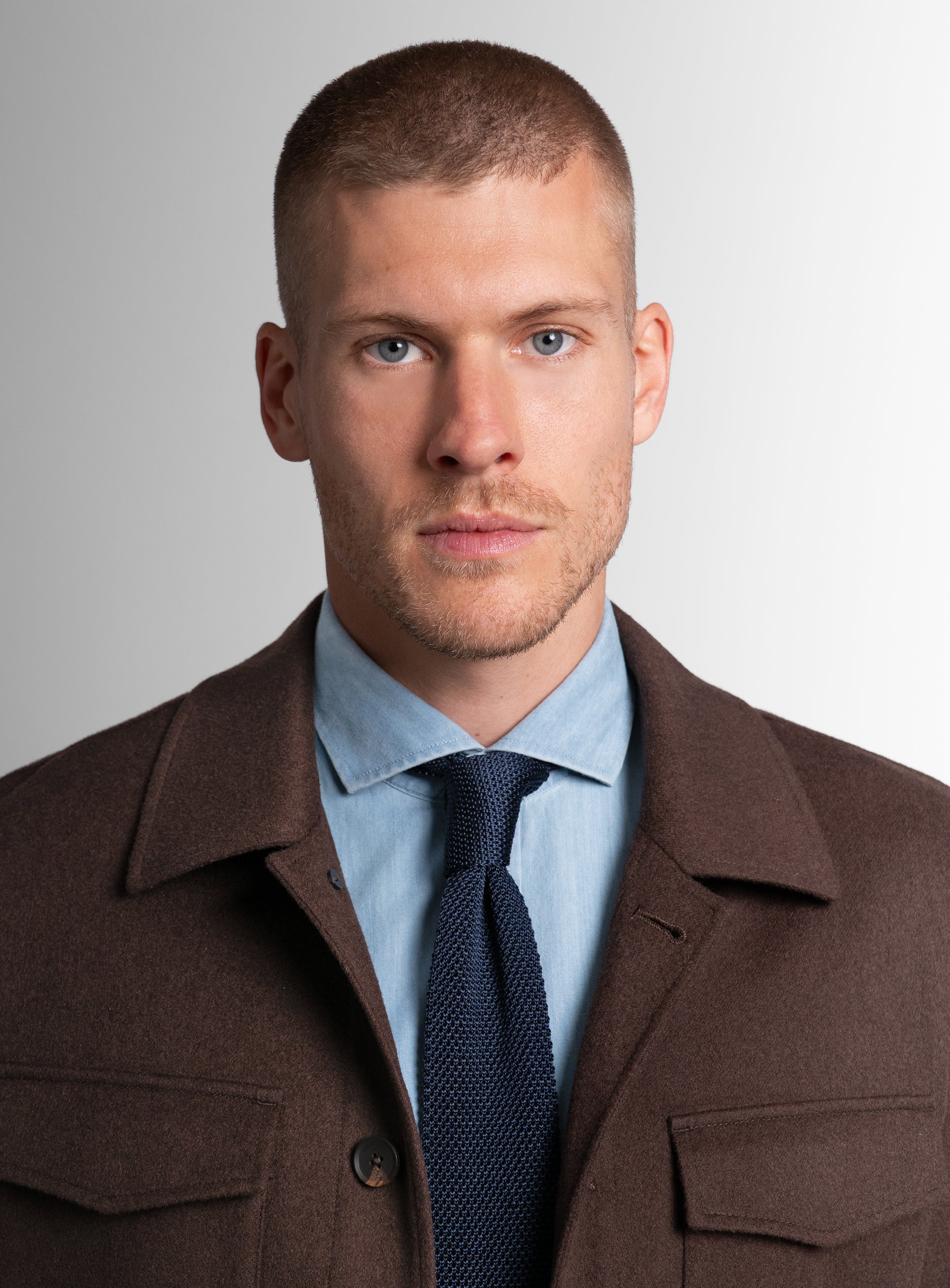 Close-up of a man wearing the Orlando Chocolate Brown Jacket