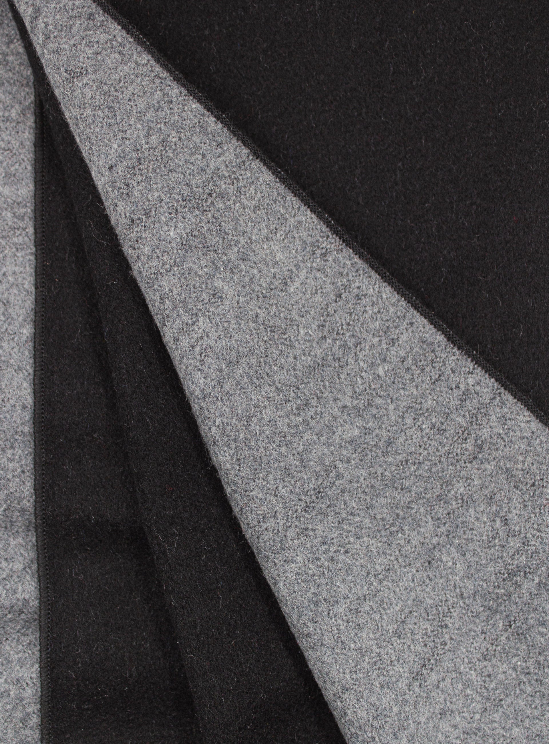 Both the front and back sides of the Black & Grey Silk Scarf