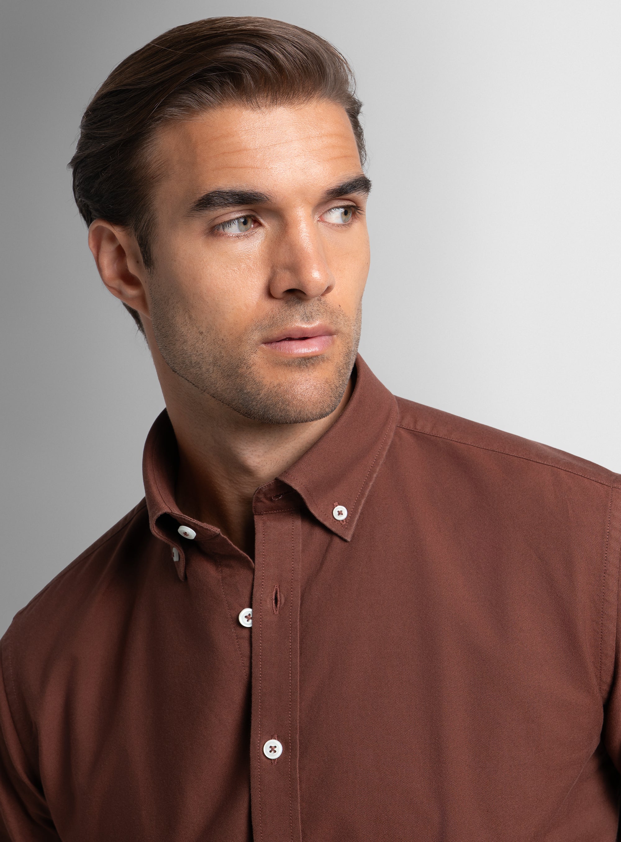 A close-up of a man wearing the Paolo Oxford Slim Fit Siena Shirt