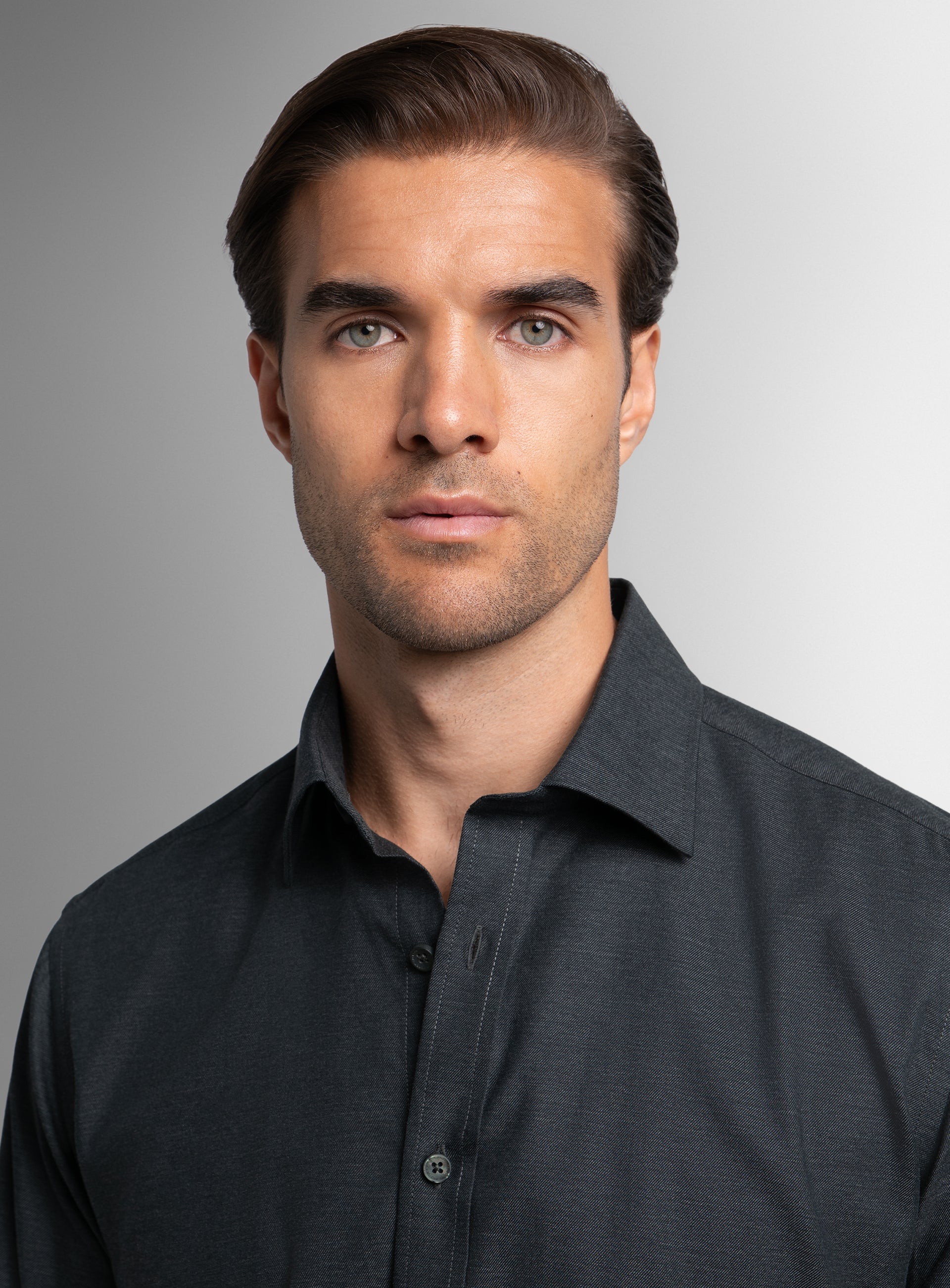 Close-up of a man wearing the Piero Flannel Slim Fit Charcoal Shirt
