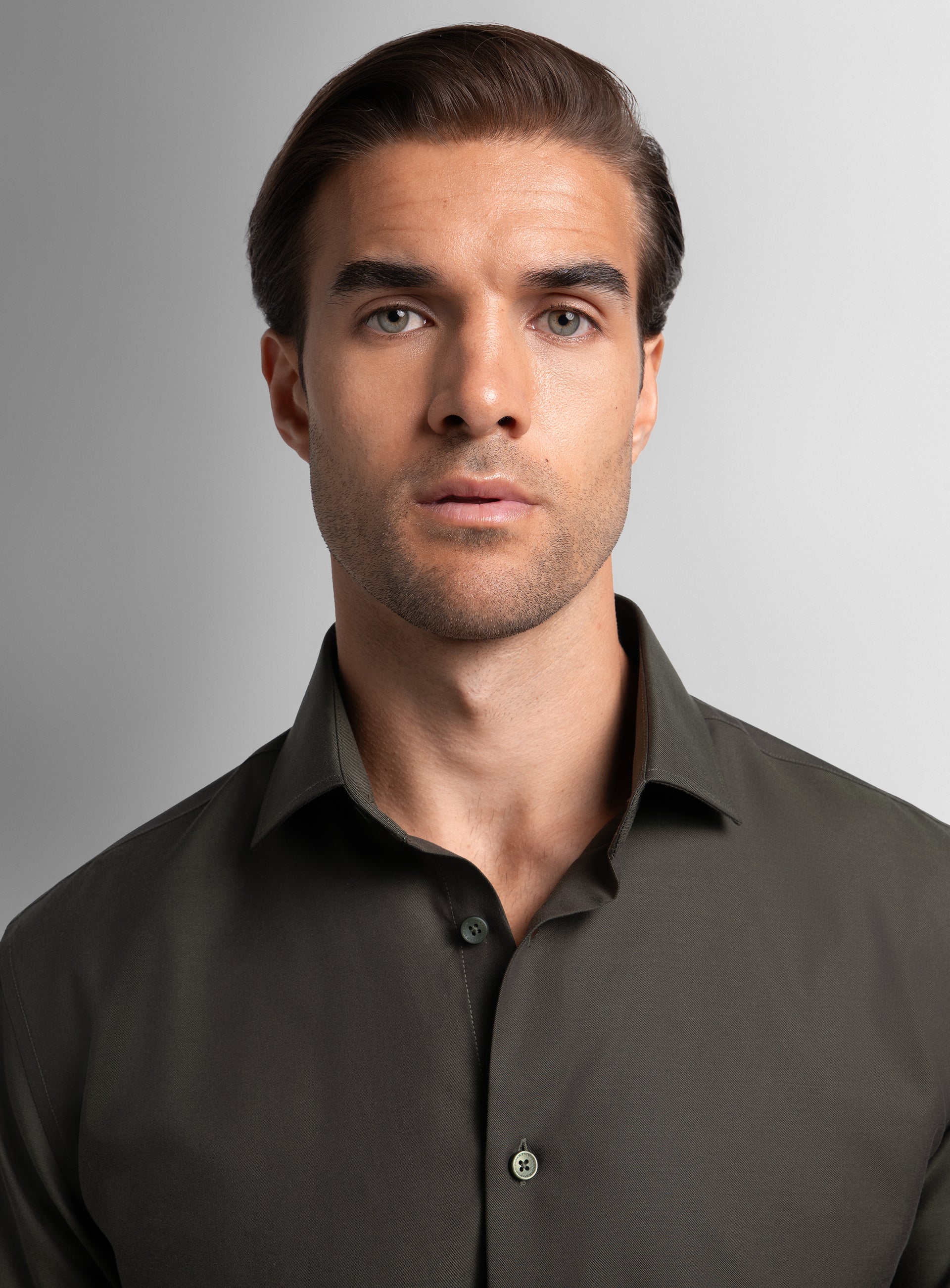 Close-up of a man wearing the Piero Flannel Slim Fit Chocolate Shirt