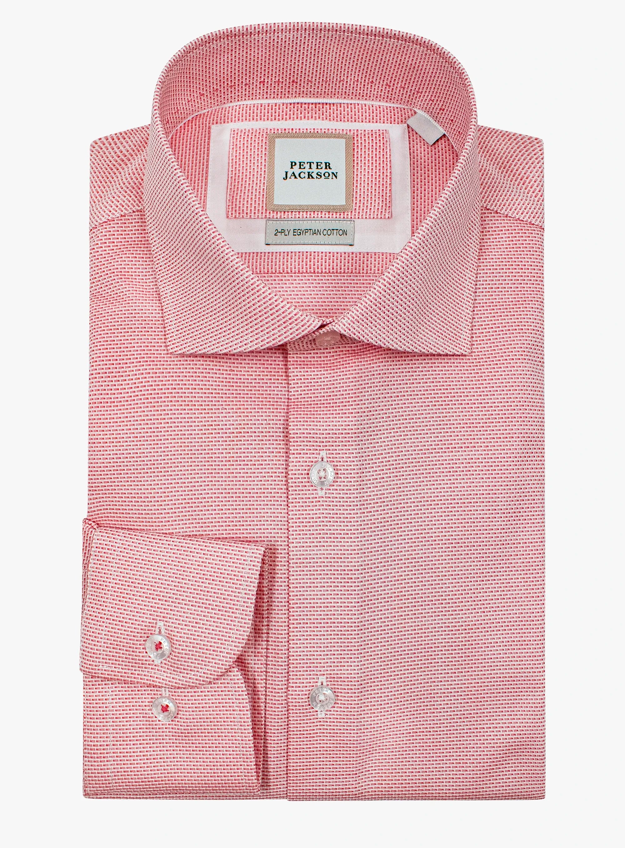 Pink dress shirt with a Peter Jackson label on a white background