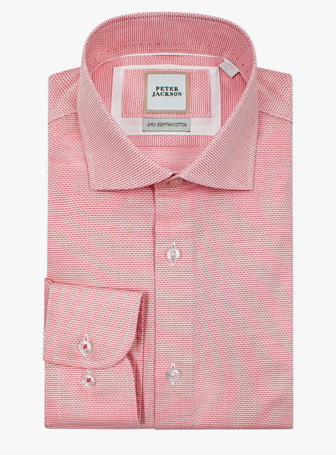 Pink dress shirt with a Peter Jackson label on a white background