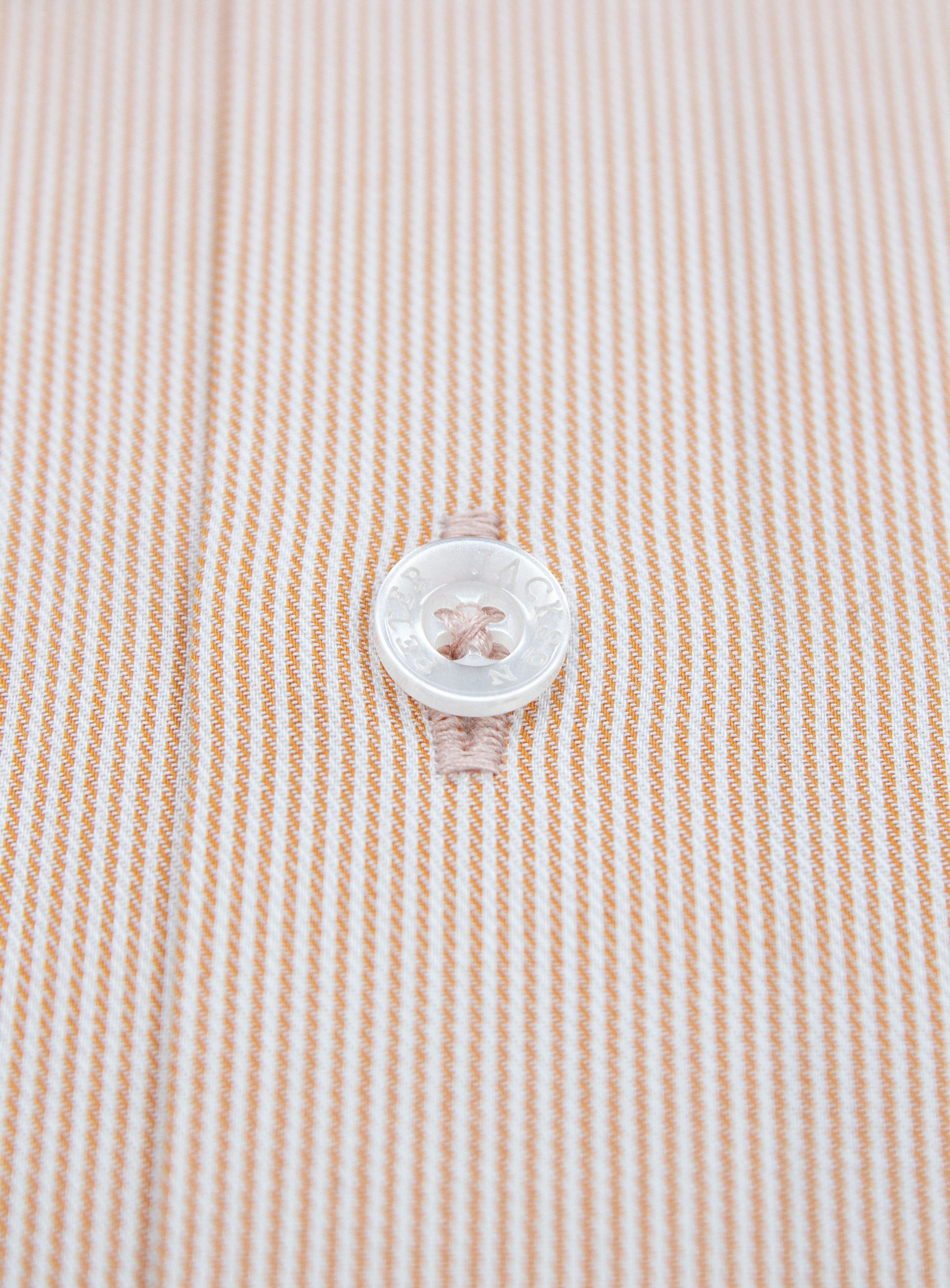 Close-up of the button on the Milan Fine Stripe Orange Shirt
