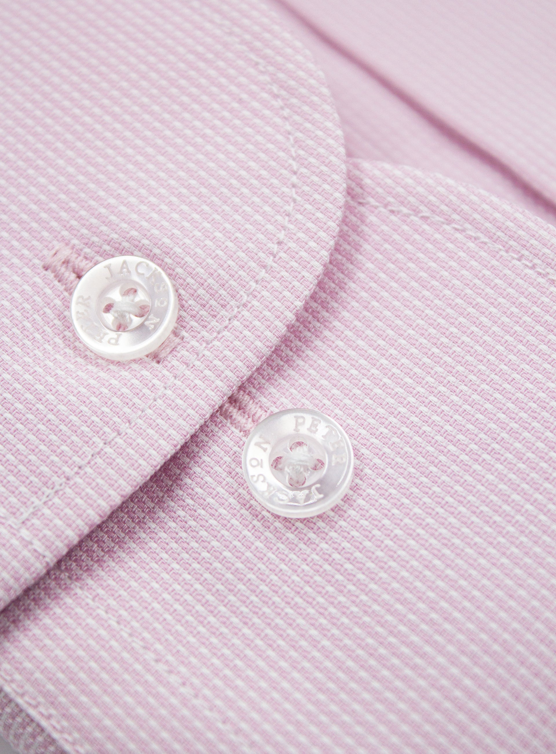 Close-up of a button on the Milan Micro Pink Shirt