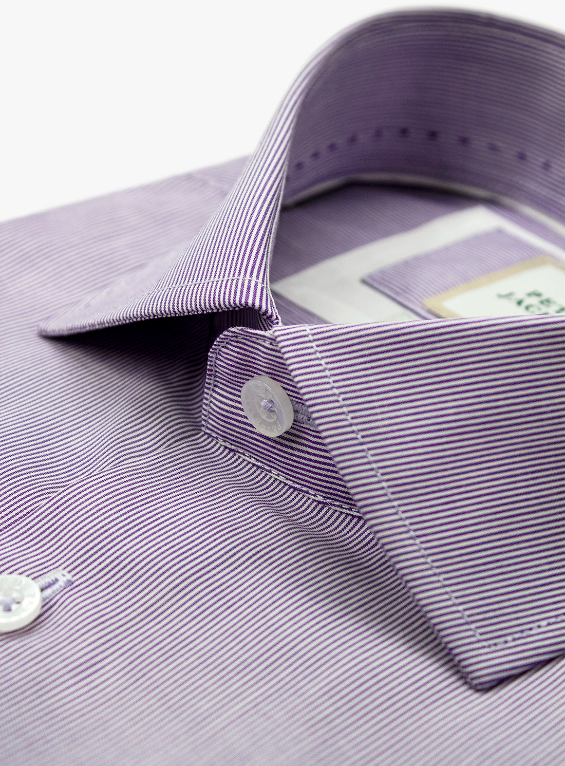 Close-up of a purple and white striped shirt with a button and collar detail.