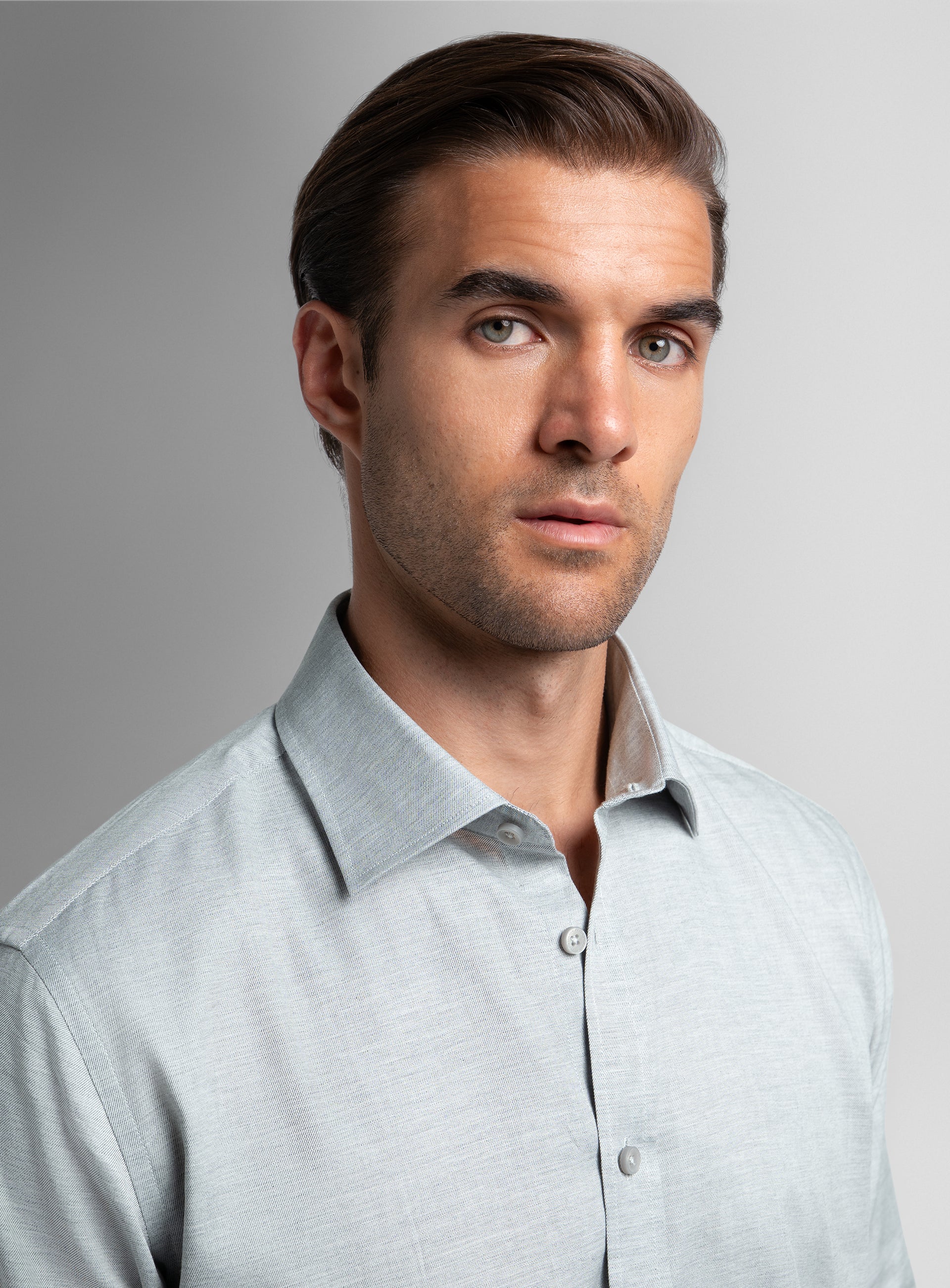 Close-up of a man wearing the Piero Flannel Slim Fit Silver Shirt