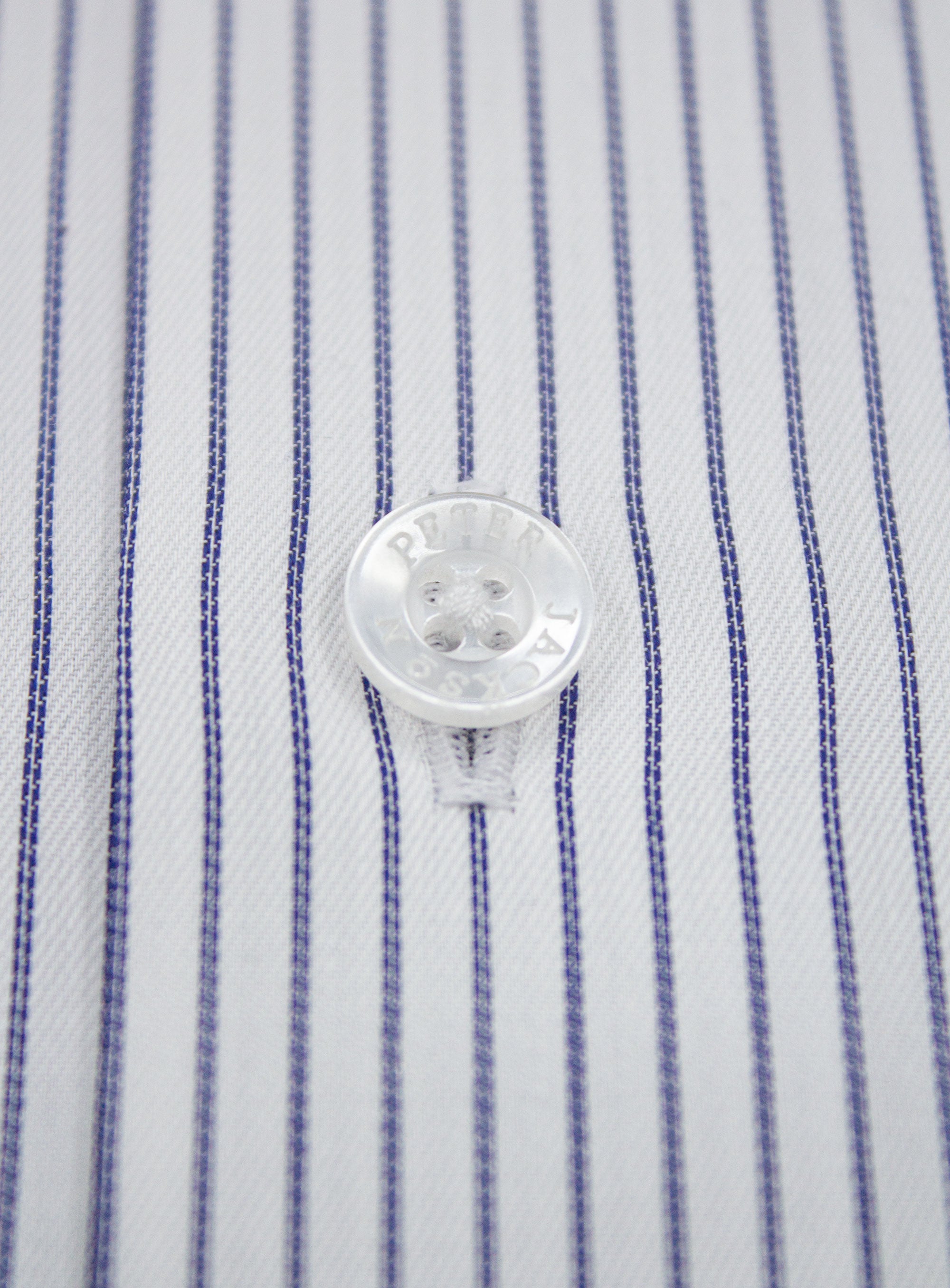 Close-up of a button on the Florence Navy Fine Stripe White Shirt