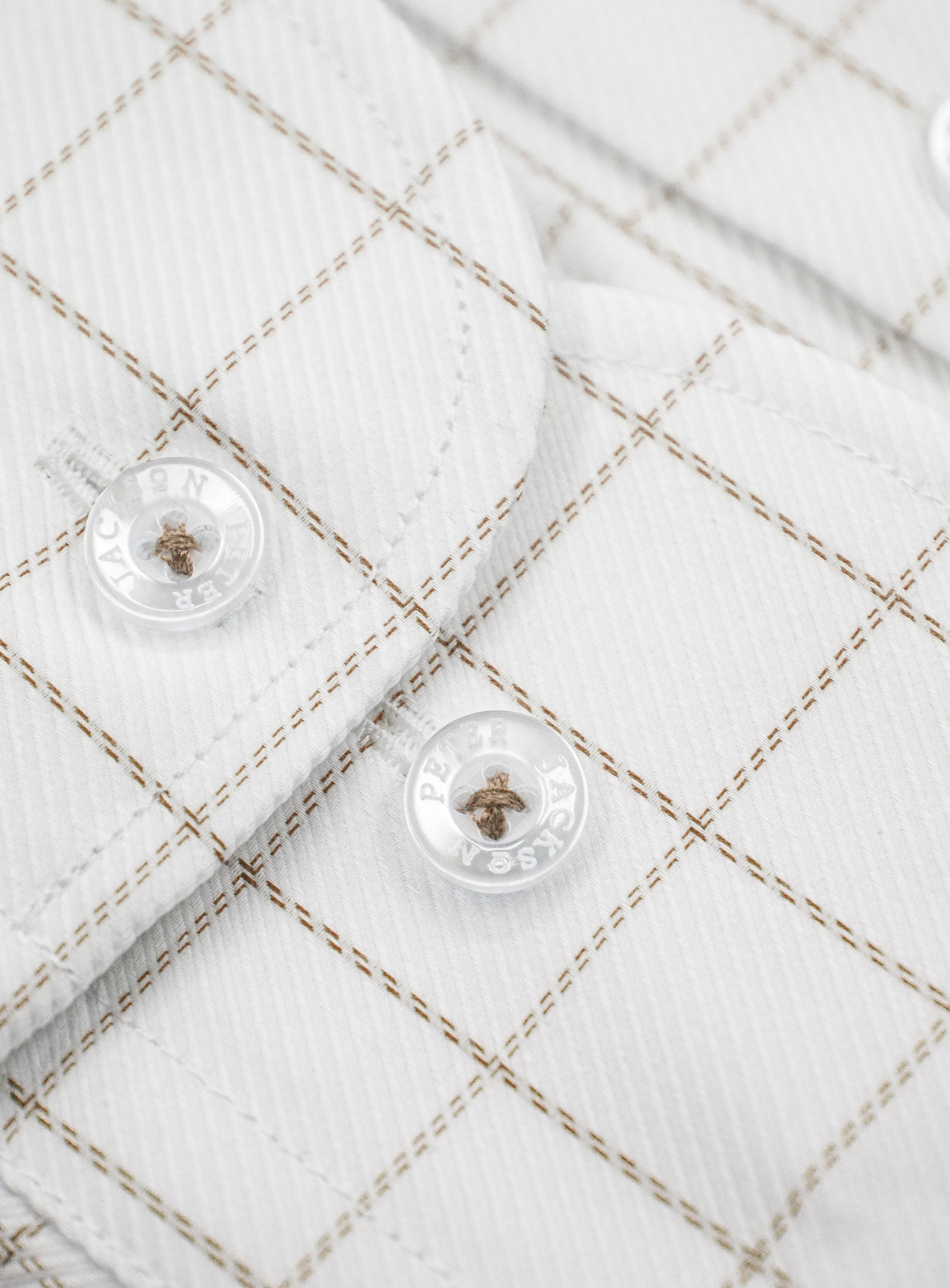Close-up of the cuffs on the Milan Twill Brown Mid-Check White Shirt