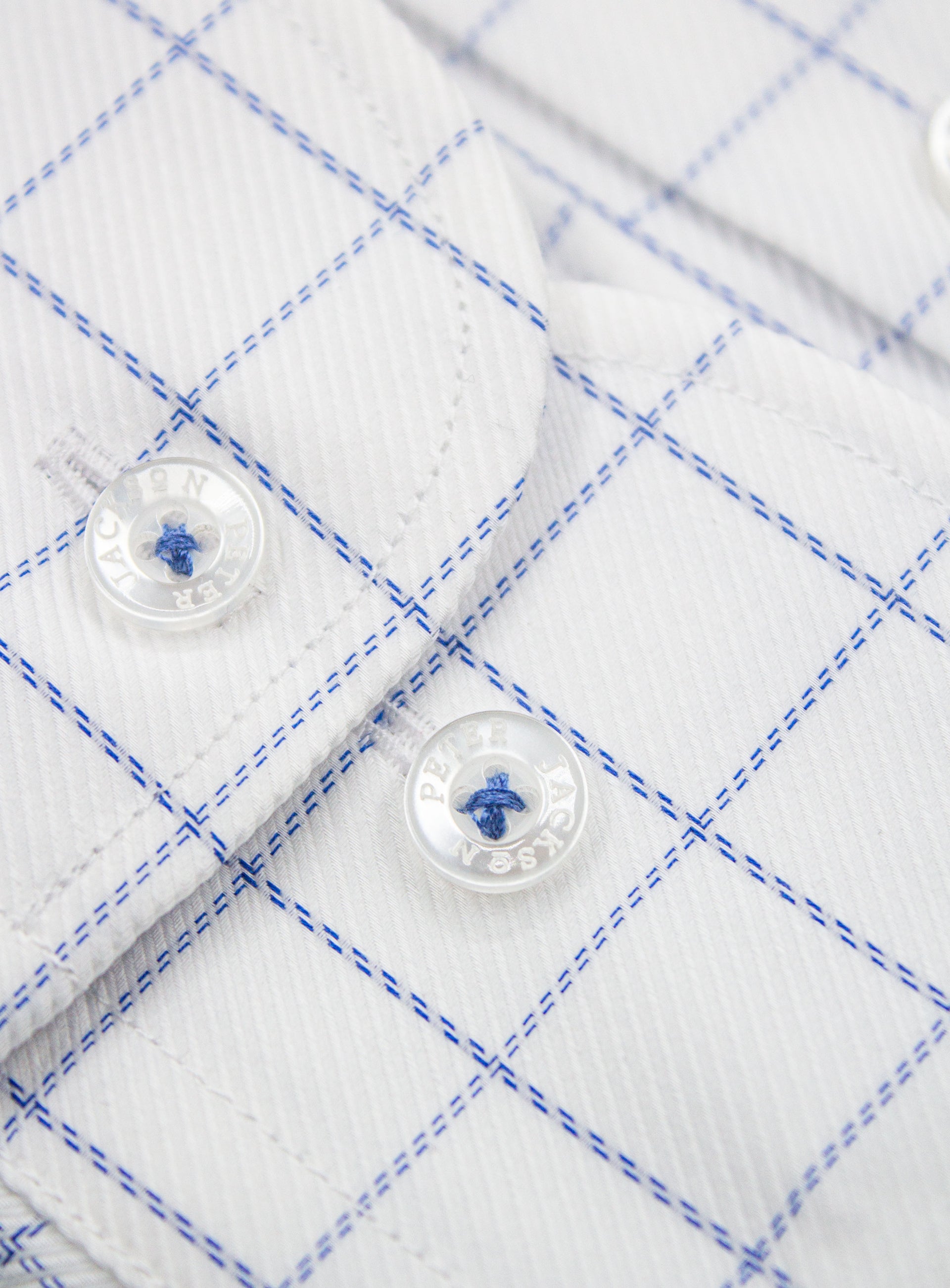 Close-up of the cuff on the Milan Twill Navy Mid-Check White Shirt