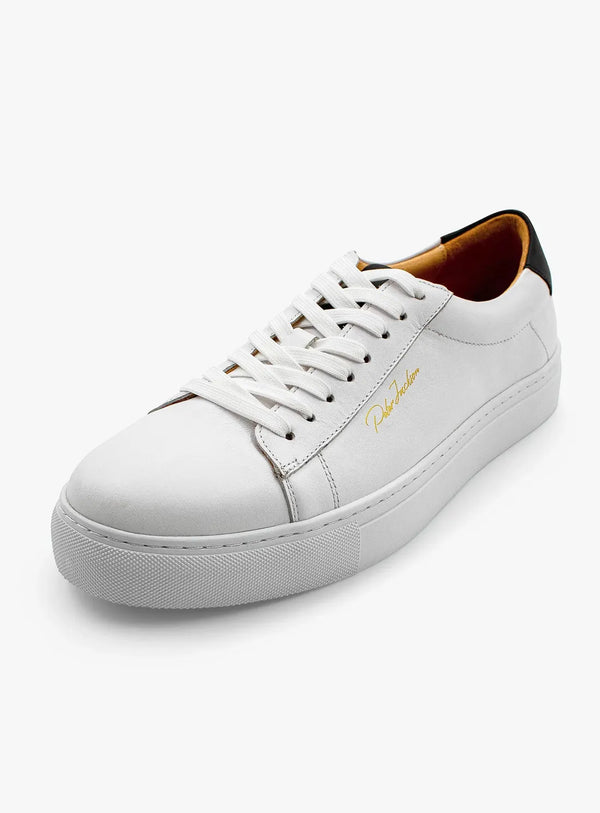 White sneaker with a brand logo on a white background