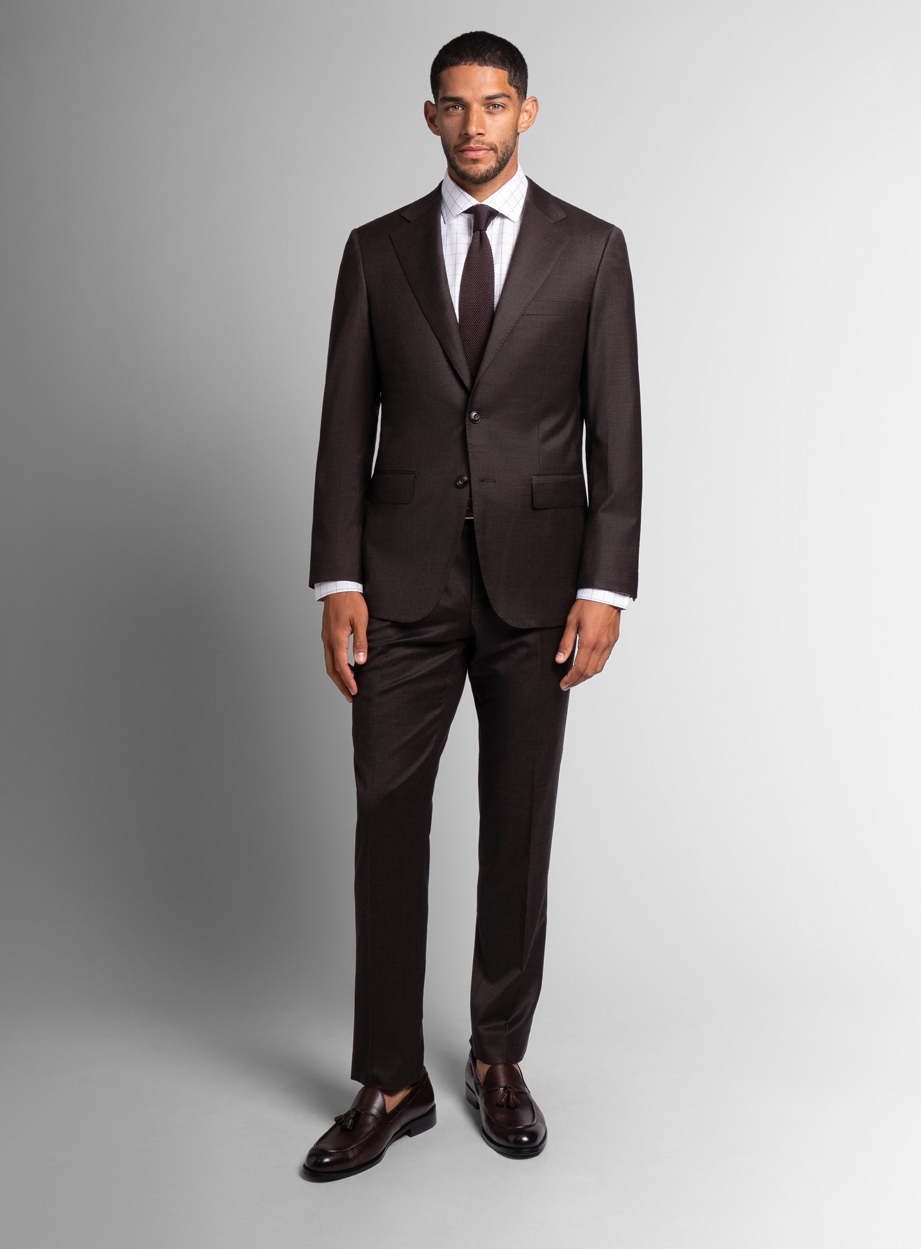 Man wearing the Vespucci Sharkskin Chocolate Brown Suit