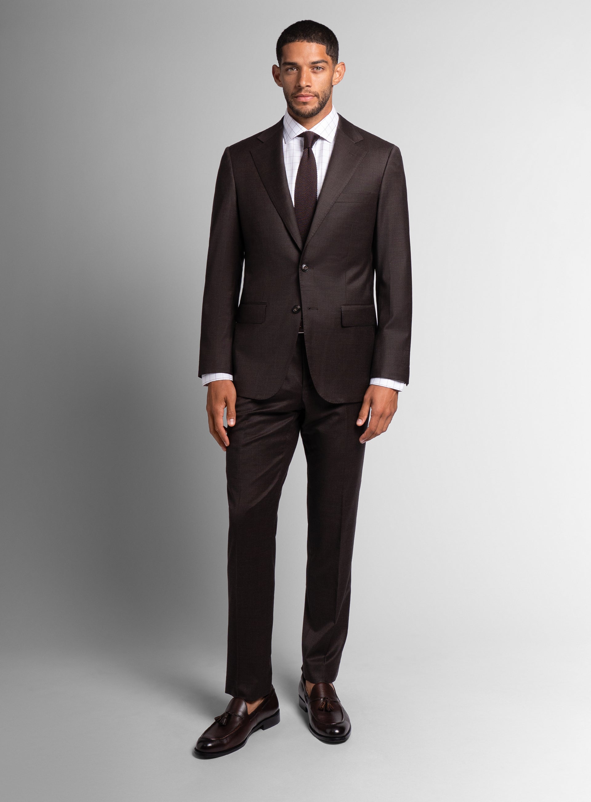 Man wearing the Vespucci Sharkskin Chocolate Brown Suit