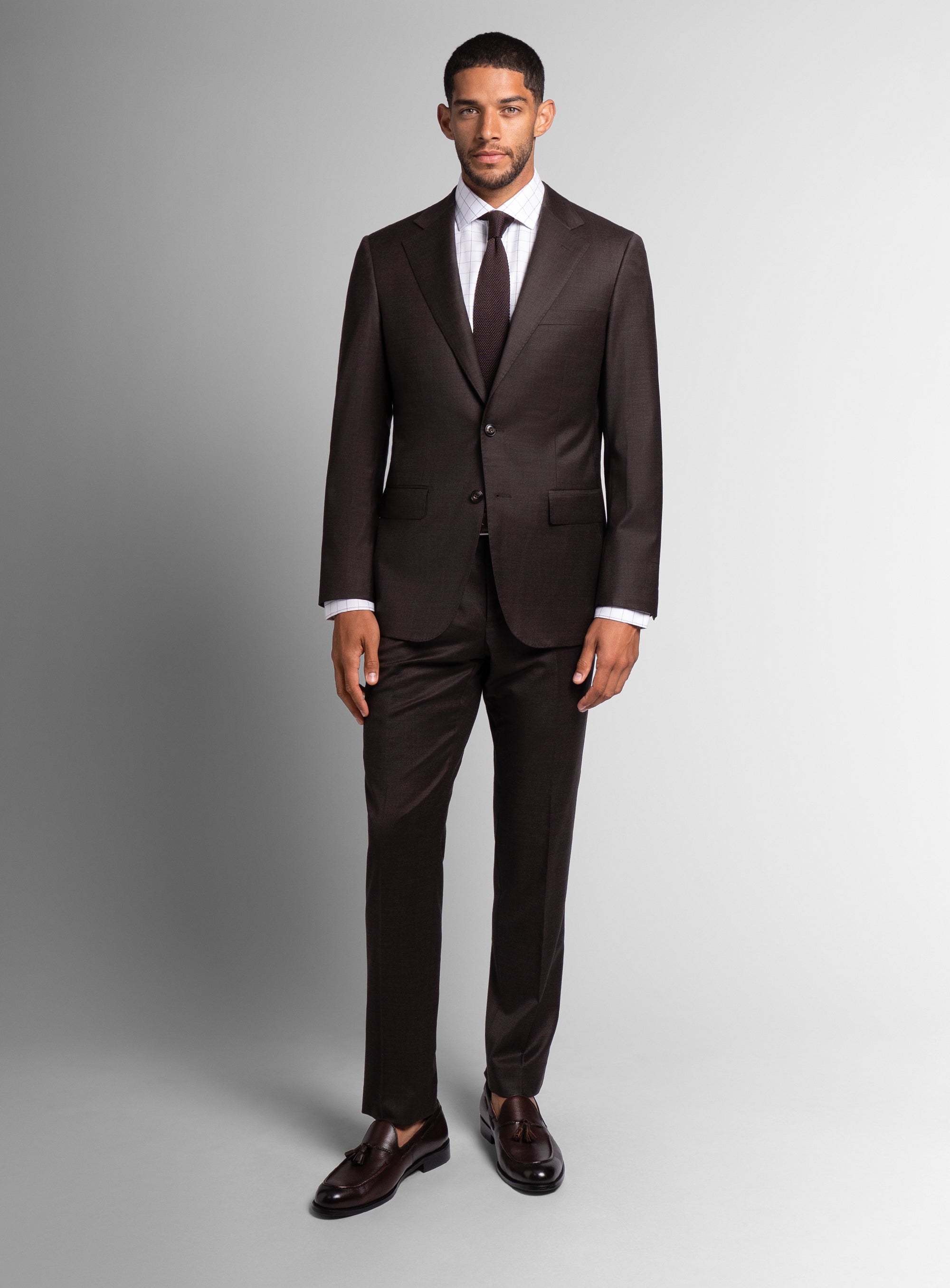 Man wearing the Vespucci Sharkskin Chocolate Brown Suit