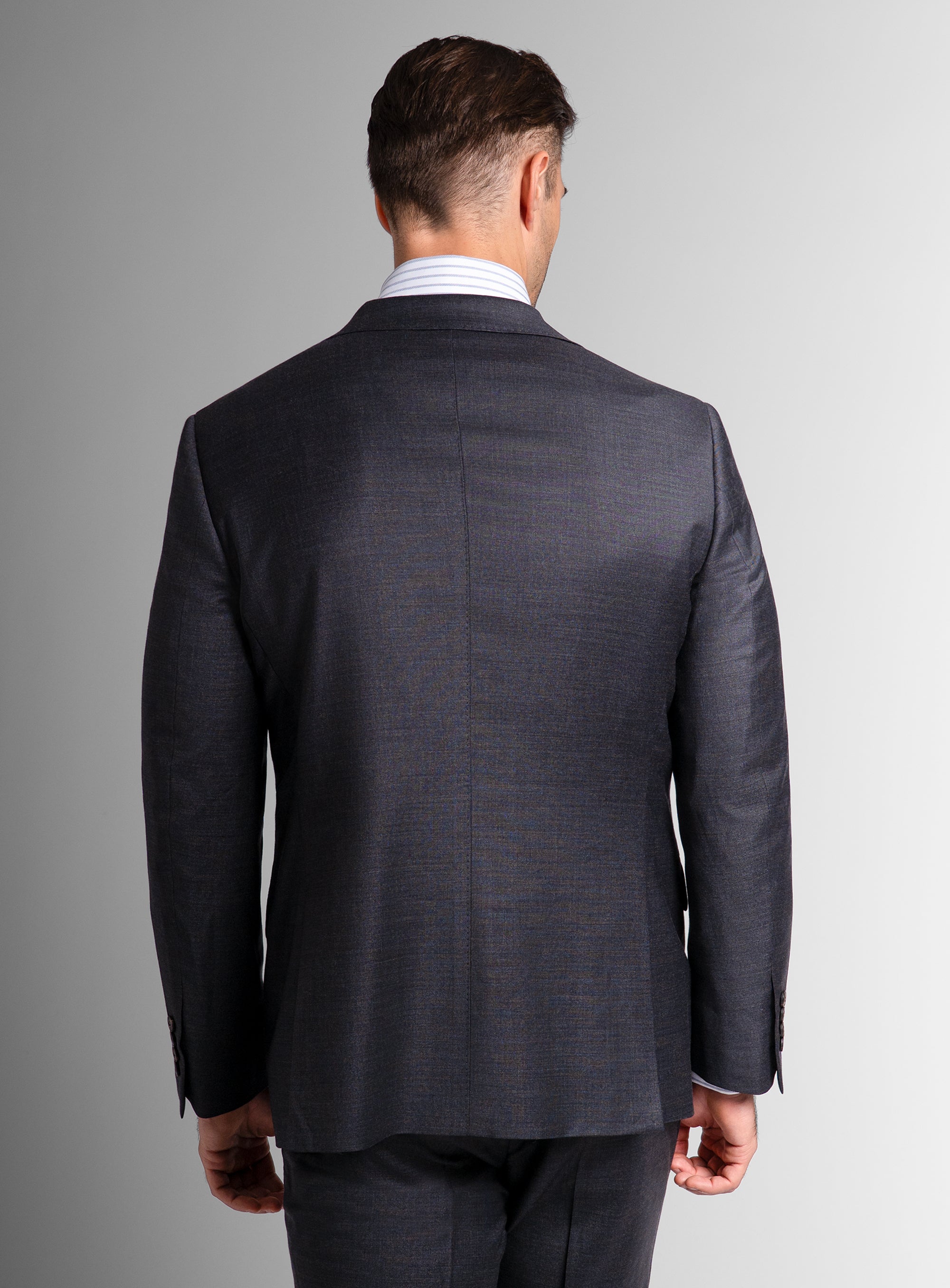 The back of a man wearing the Belmondo Charcoal Grey Suit