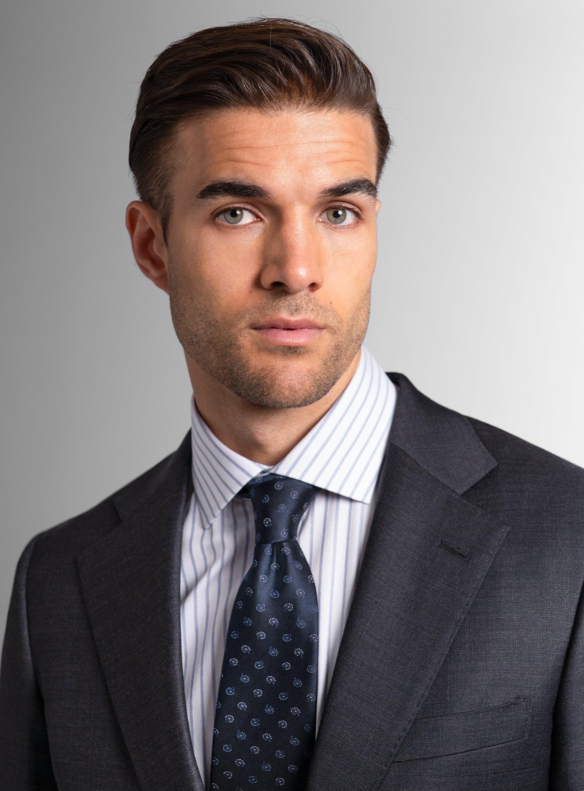 Close-up of man wearing the Belmondo Charcoal Grey Suit