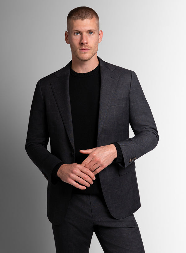 Man wearing charcoal grey suit