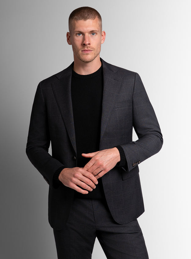 Man wearing charcoal grey suit